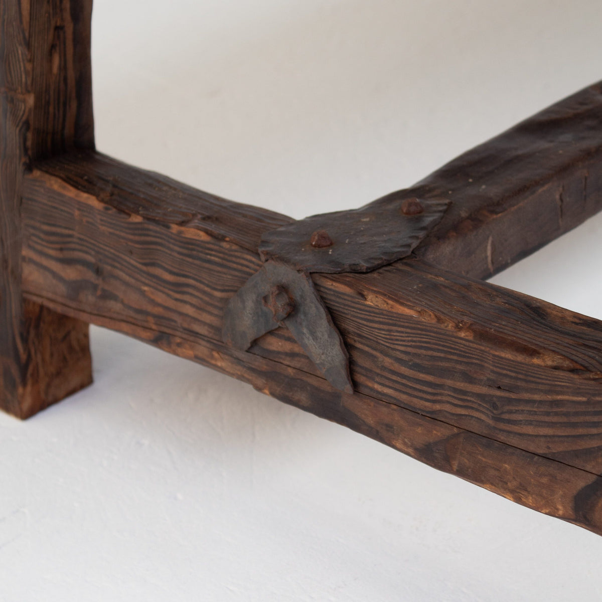 Brutalist Solid Wood Coffee Table — close-up of textured wooden leg detail