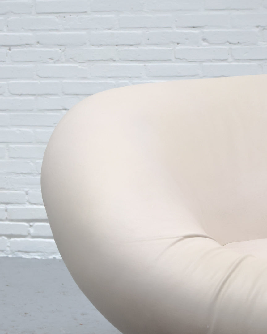 Cream upholstered Krokus armchair by Lennart Bender detail view