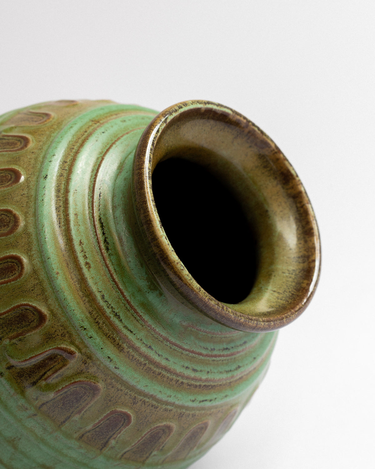 Green Glazed Relief Vase by Erik Mornils, 1930s-40s — lifestyle setting