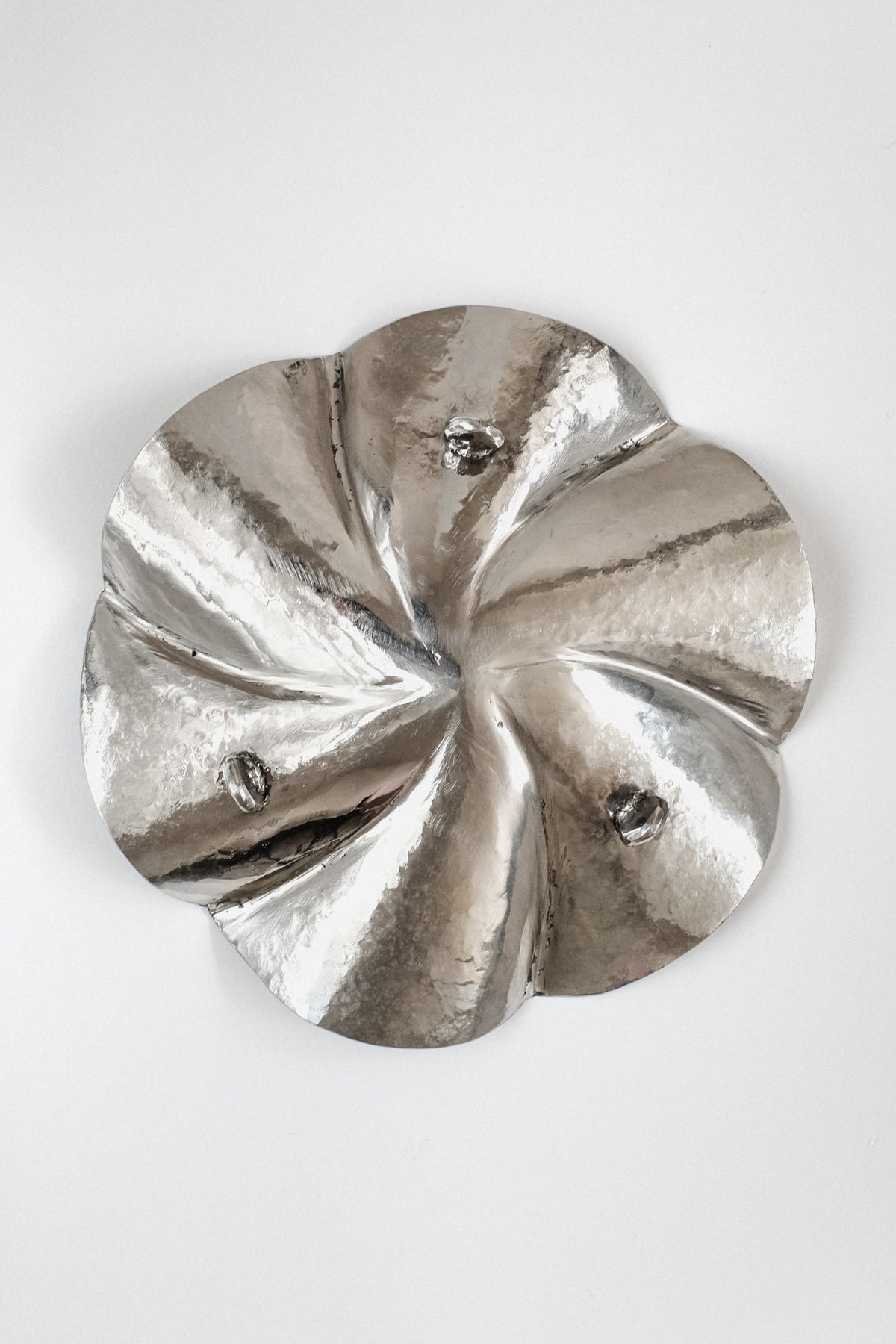 Decorative Footed Bowl — top view of hammered silver surface
