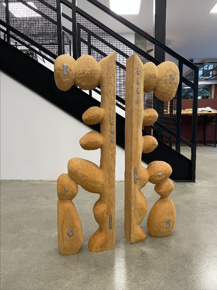Pair of carved oak figural sculptures by Karim Charlebois, Étude 31