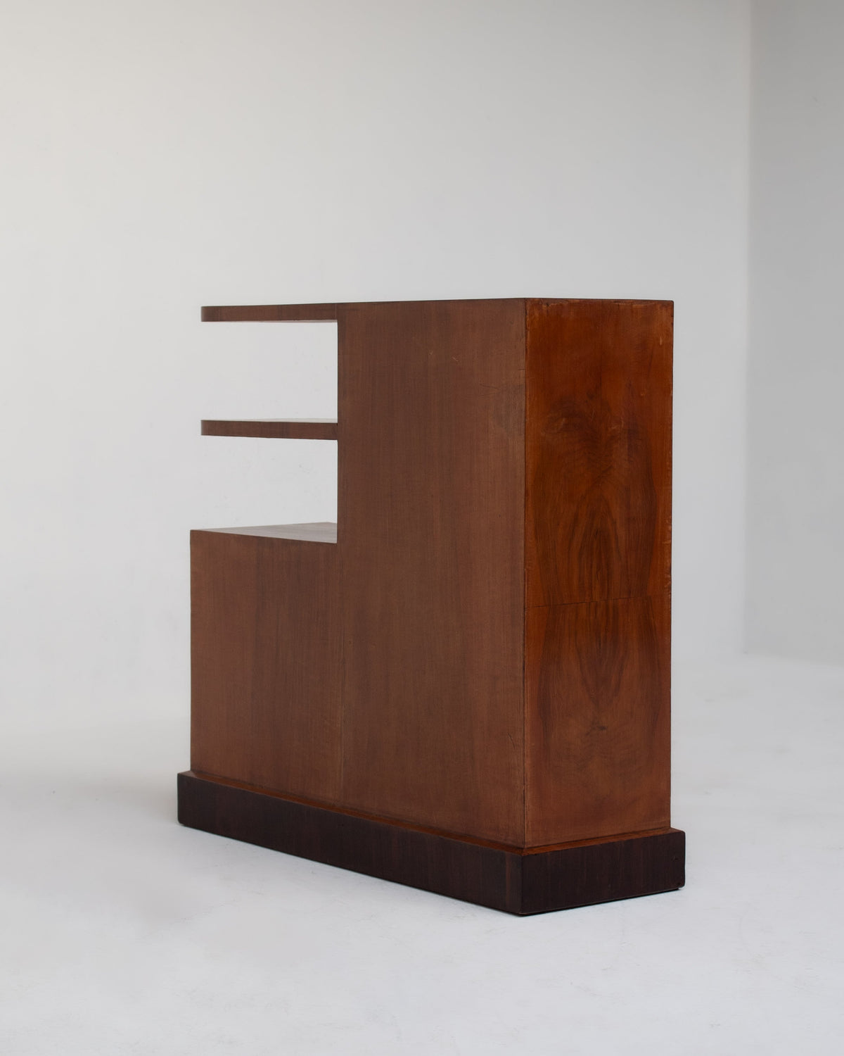 Art Deco walnut storage cabinet with stepped shelves side view