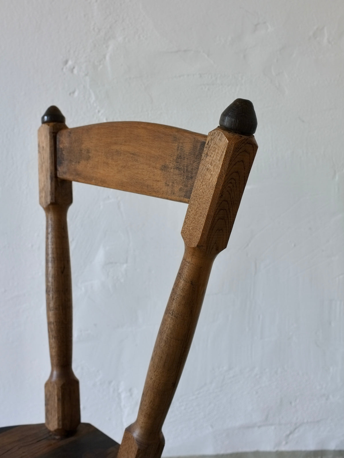 Close-up detail of brutalist dining chair backrest and joints