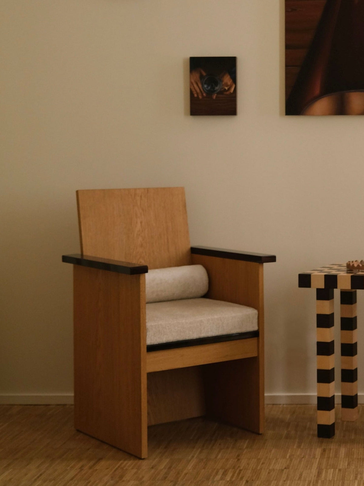 Le Parfait Armchair — oak frame in minimalist living room