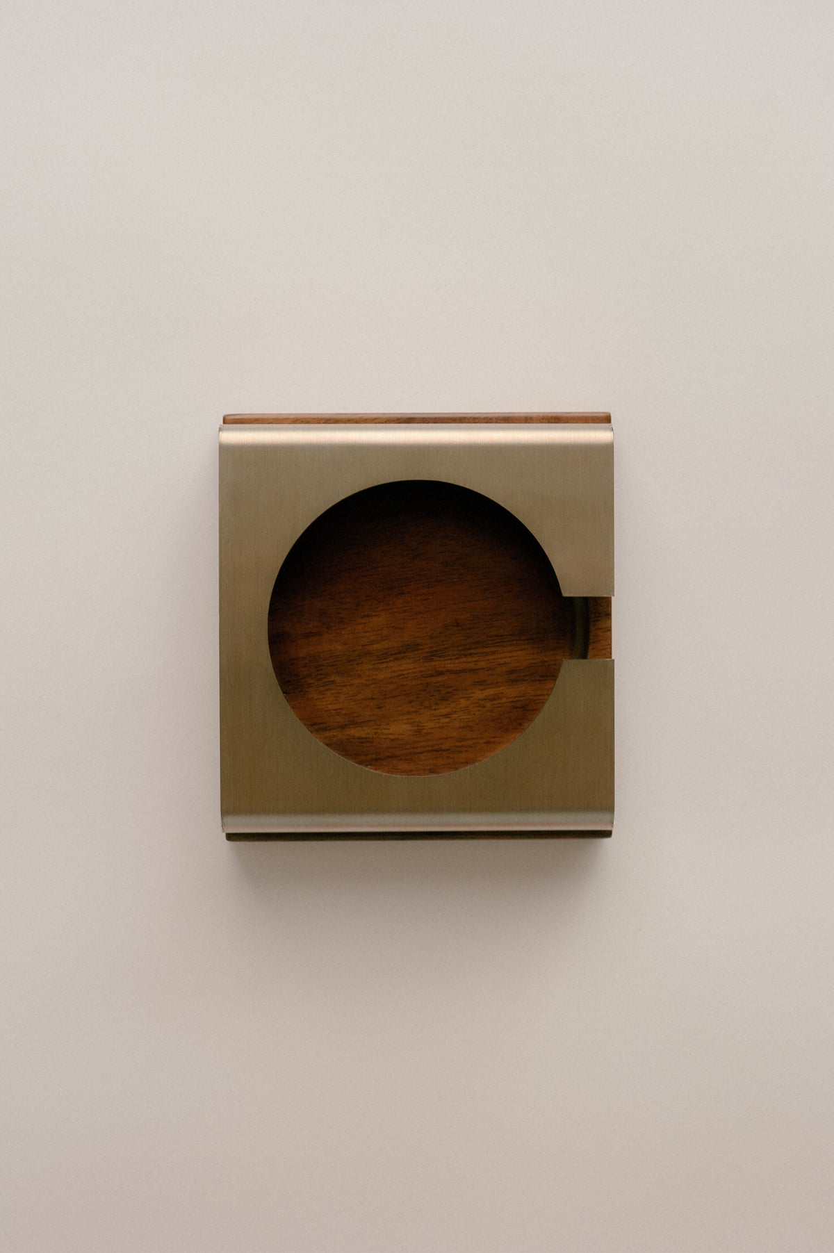 C1 wooden coaster set showing circular cutout detail in beige frame