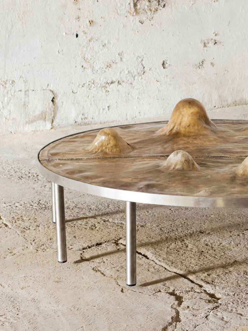 Phantom: Rawhide' Table — angled view highlighting textured rawhide surface