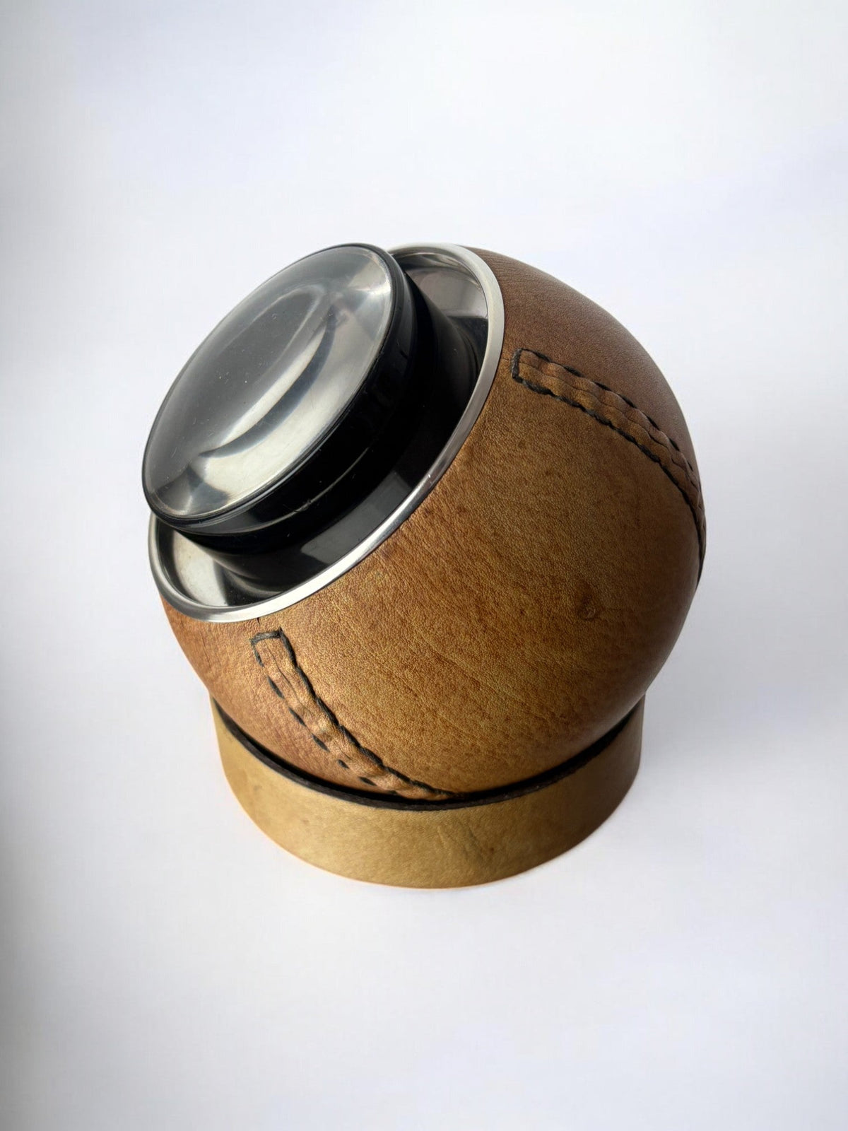 Circular cigarette box with support in leather, Spain, 1980's — detail view