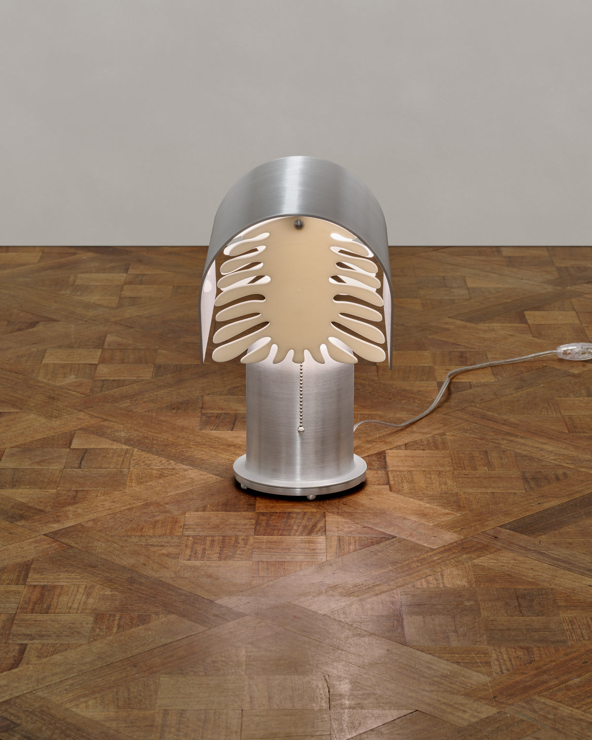 Bloom table lamp aluminum shade detail showing perforated pattern
