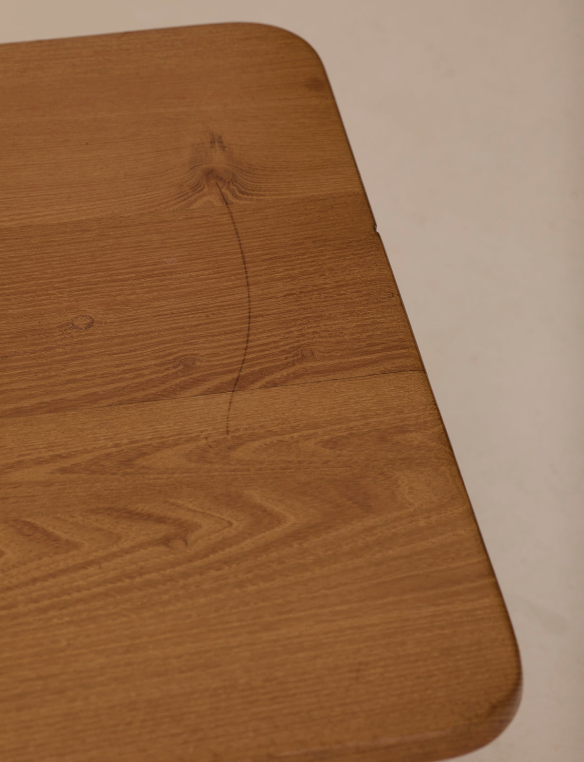 Solid elm coffee table by Alain Gaubert, France circa 1980 — close-up of wooden surface showing grain detail