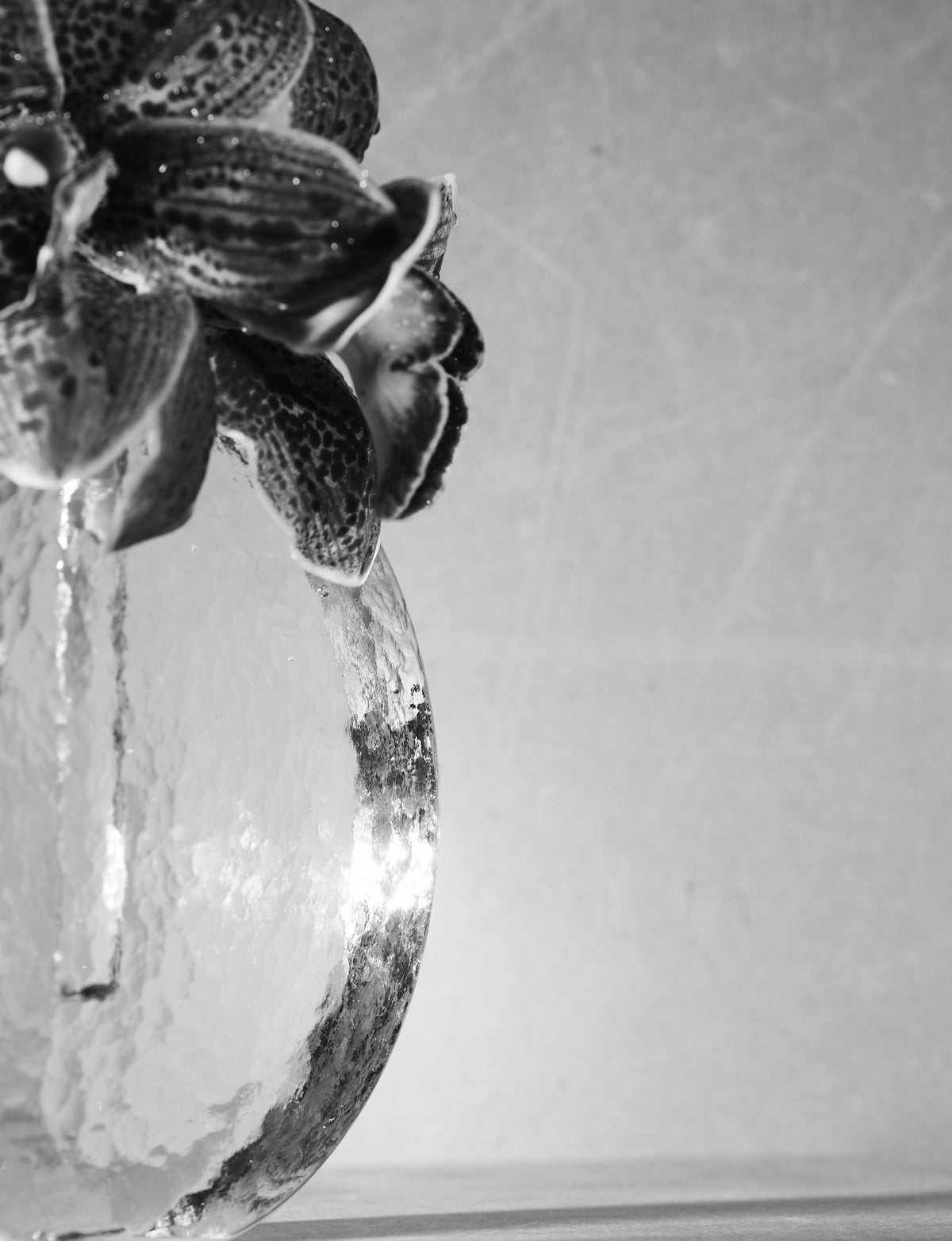 Scandinavian solifleur vase in clear glass c. 1960 — close-up of textured glass surface