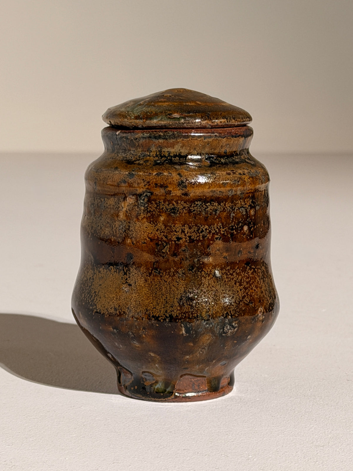 Covered glazed stoneware pot, France, circa 1960–1970. — lifestyle setting