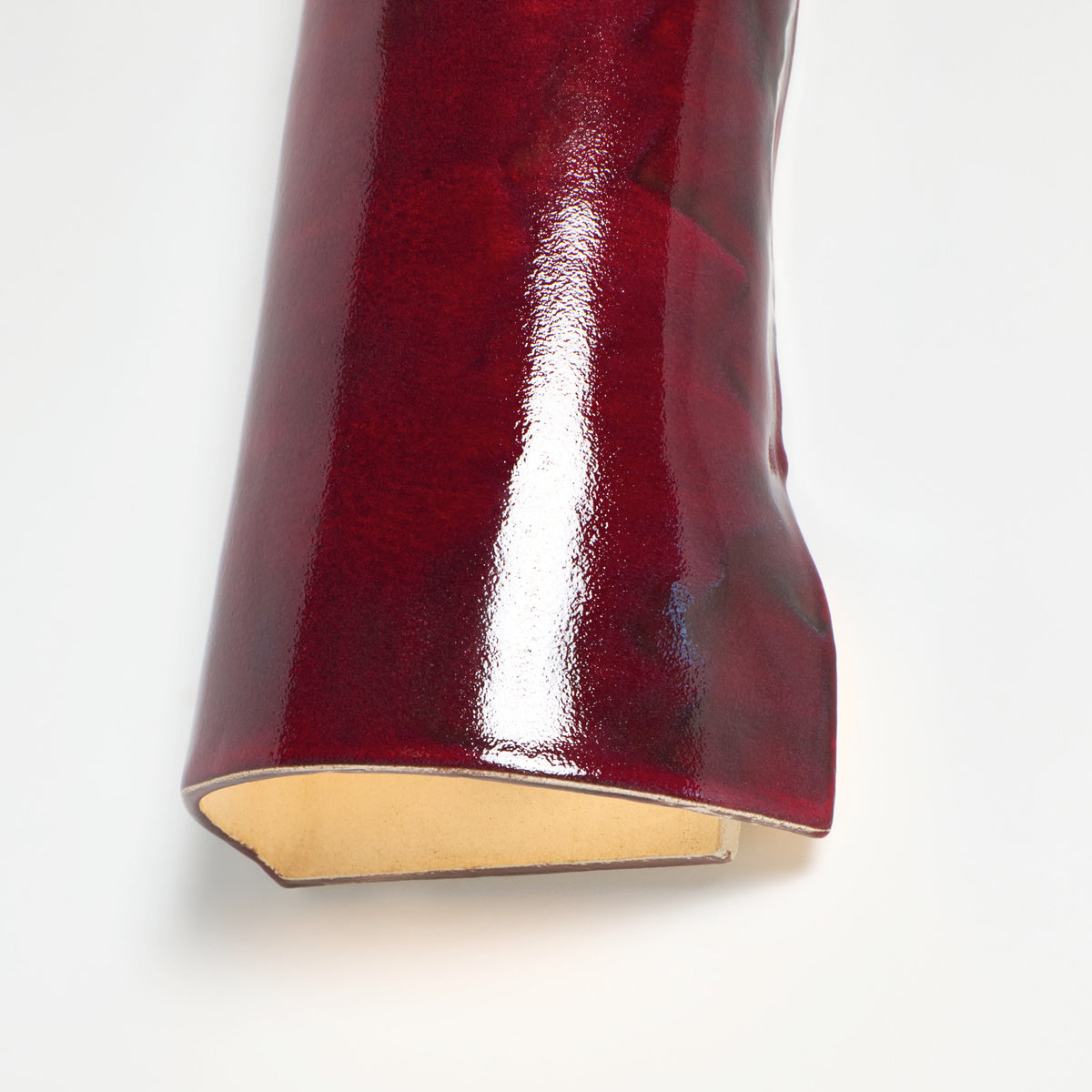 Papel Wall Light (large) — close-up of glossy red finish