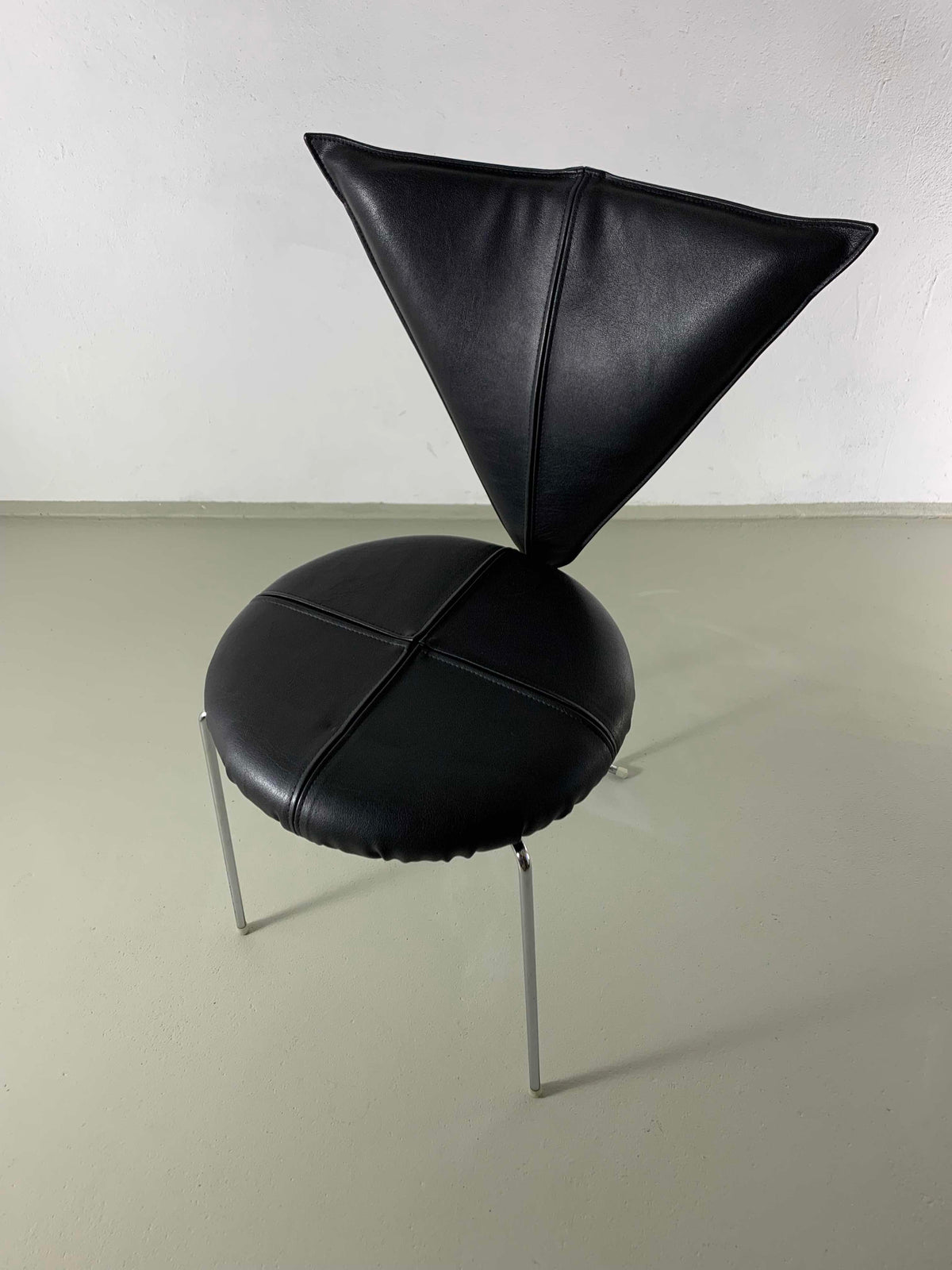 Black leather Lubke chair back detail view Germany 1990s