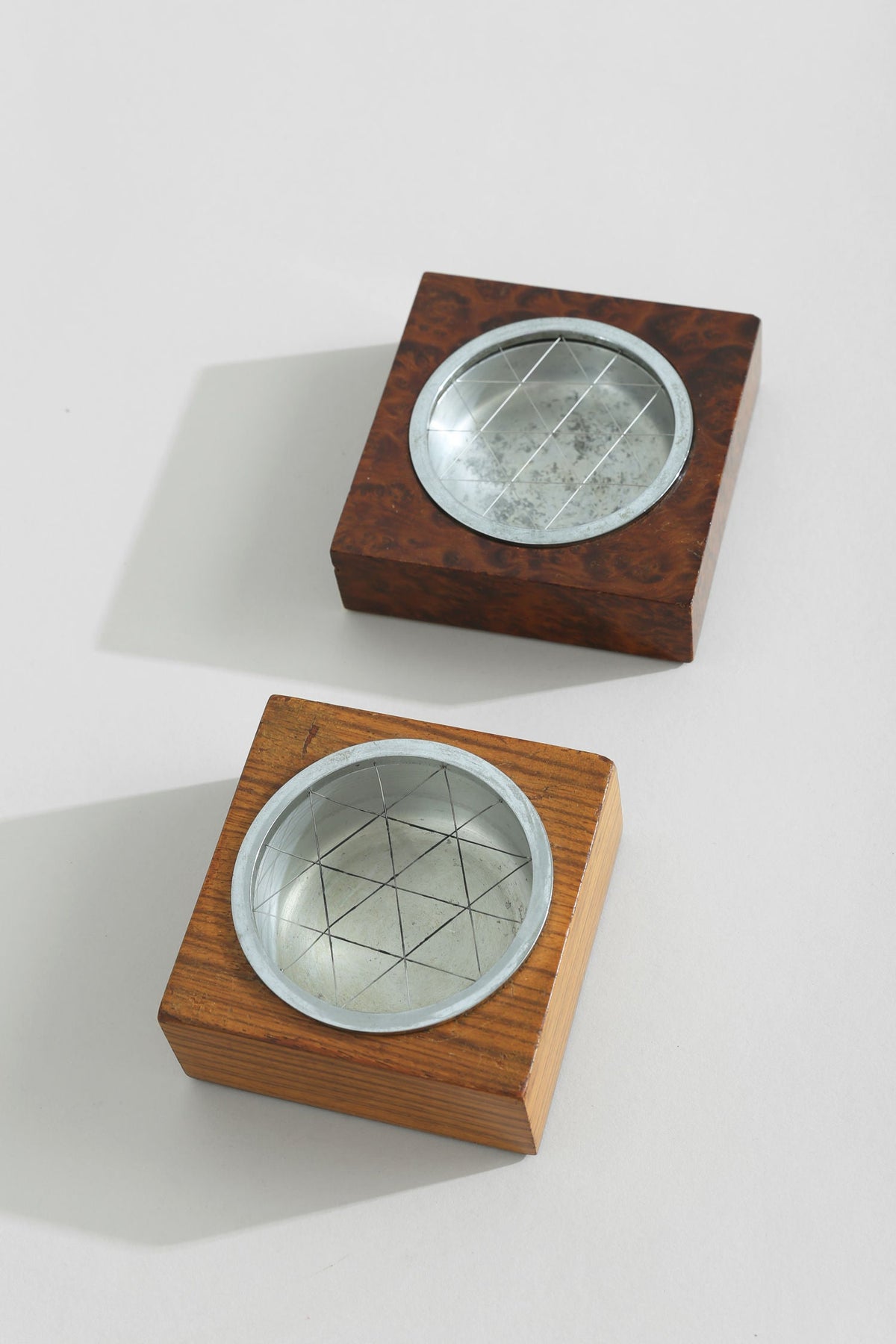 Two mid-century wooden ashtrays with etched glass inserts detail