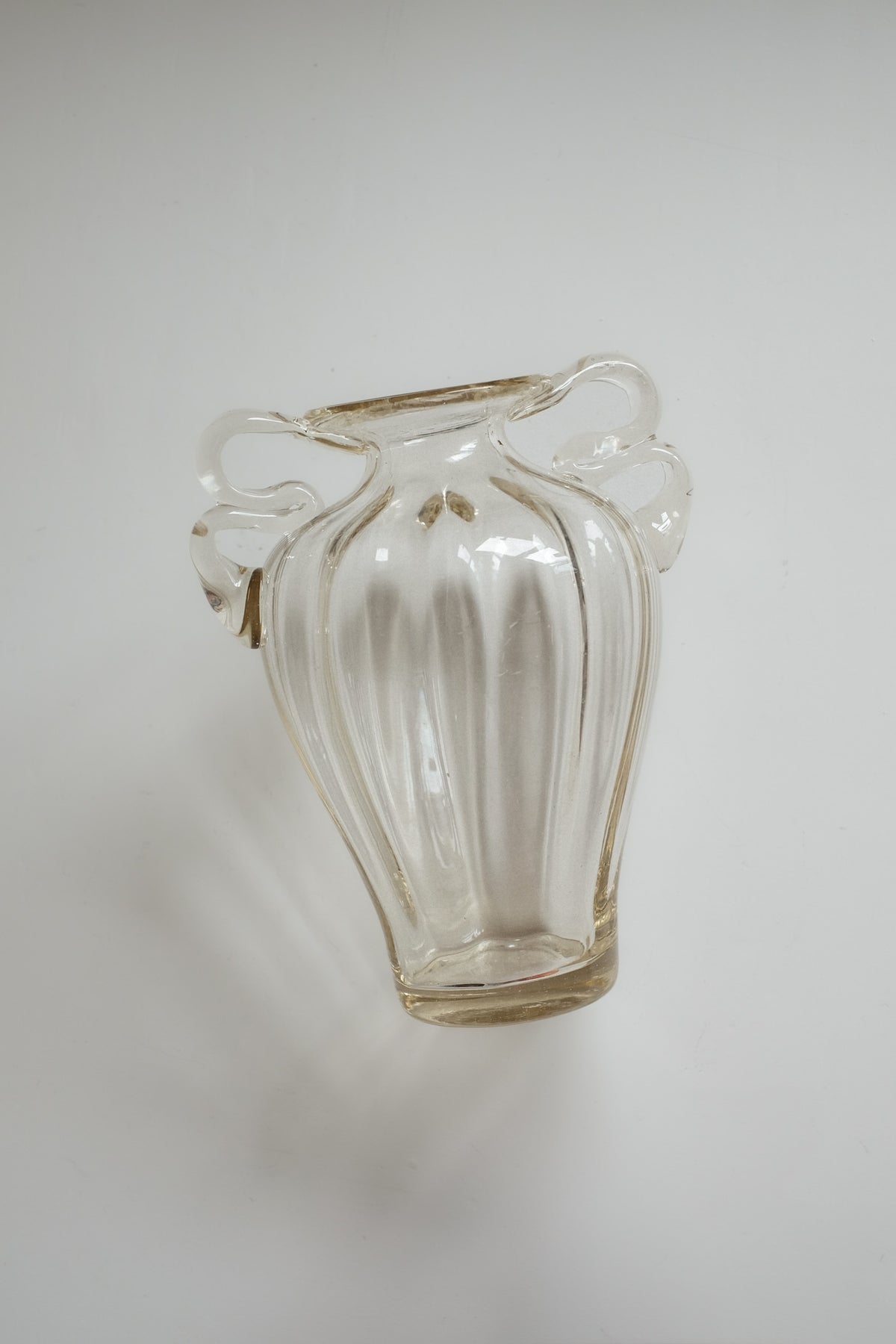 Elegant Handcrafted Glass Vase with Decorative Handles by septembre studios | The Oblist