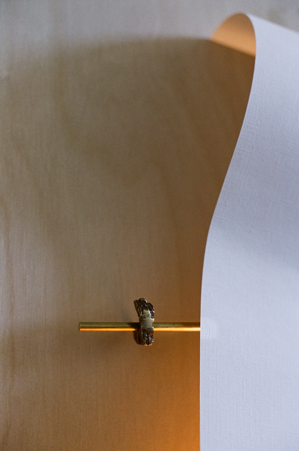 Wall Light - Papēr II — side angle showing brass and paper materials