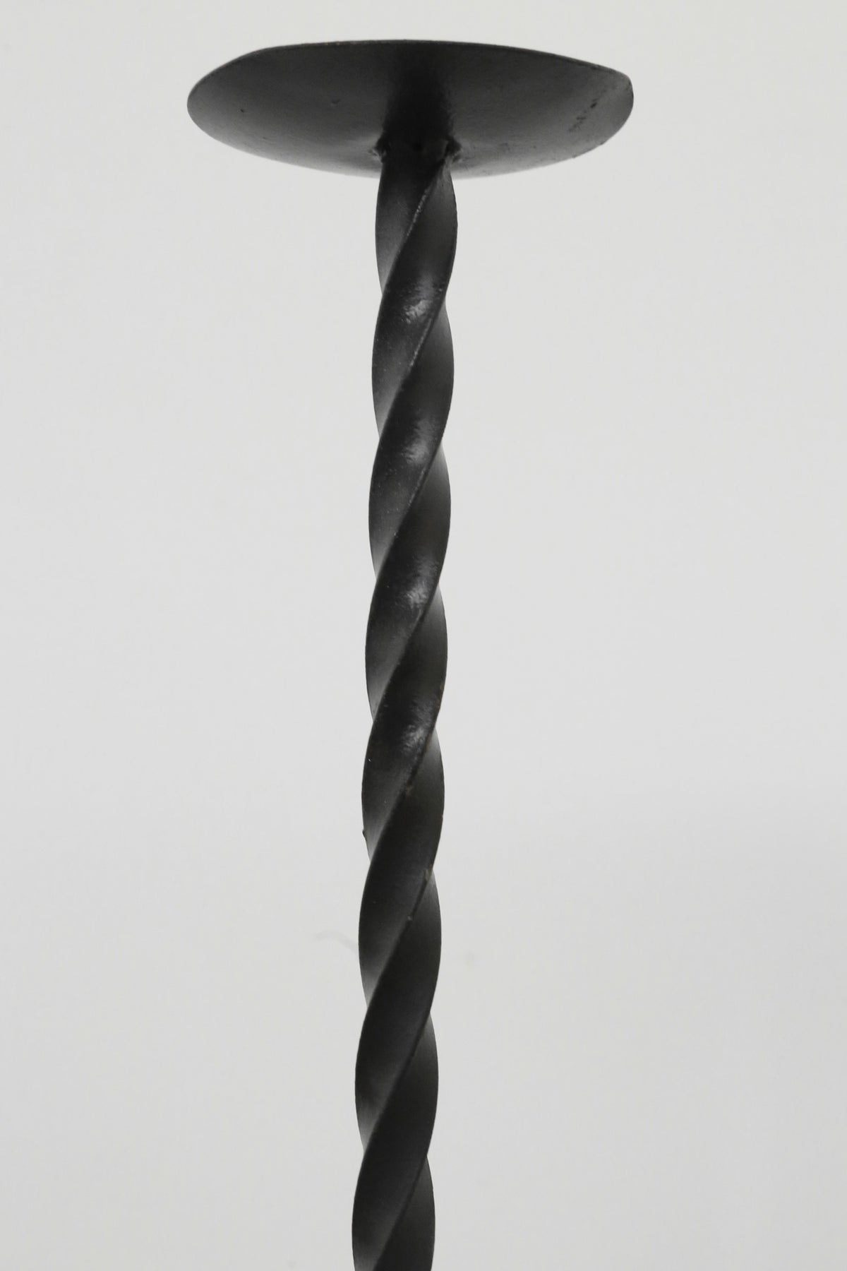 Twisted Iron Floor Candleholder Set — close-up of twisted black iron design