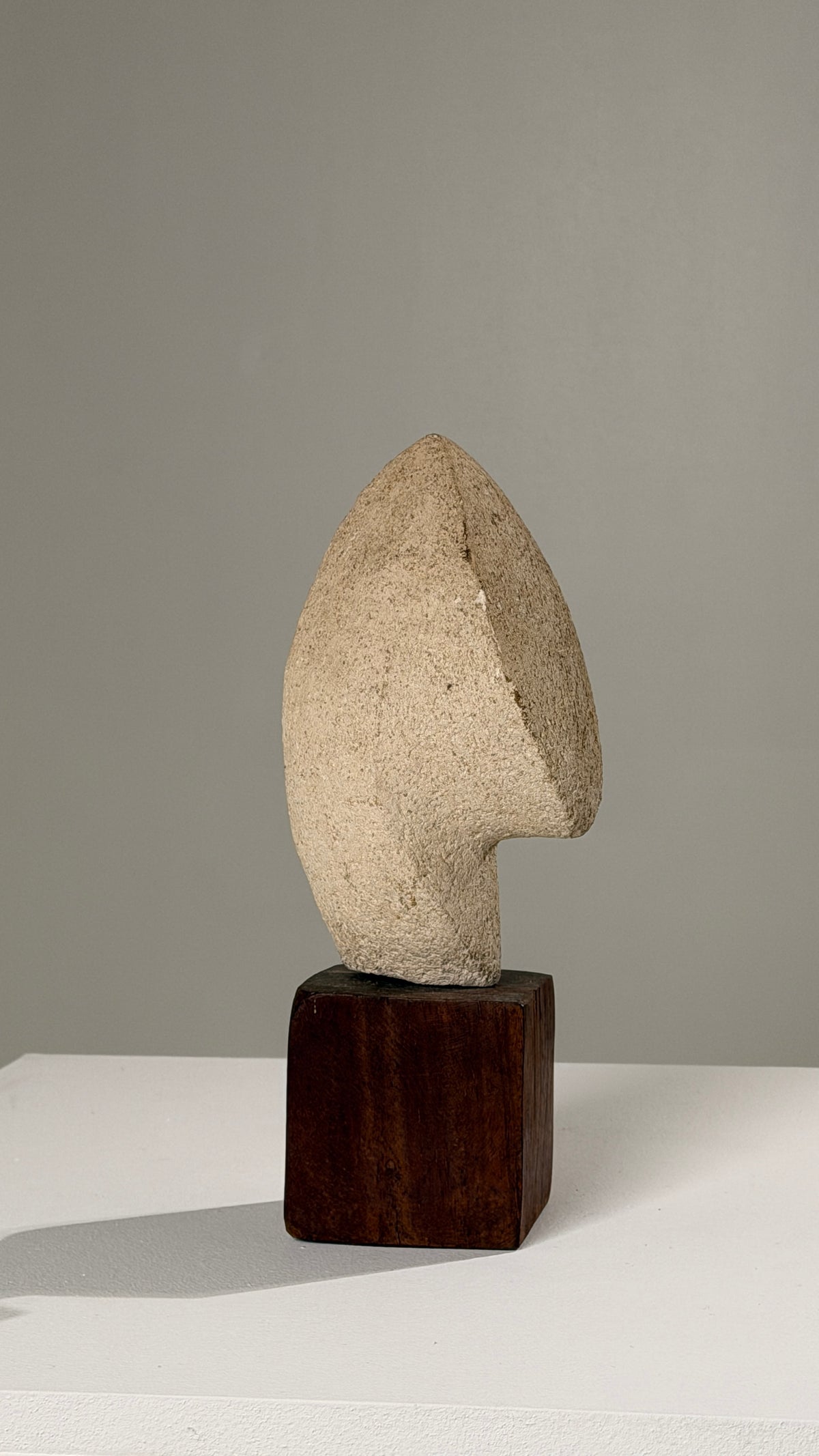 Stone Sculpture on Base, Anonymous Artist, France, circa 1950 — side view on white pedestal