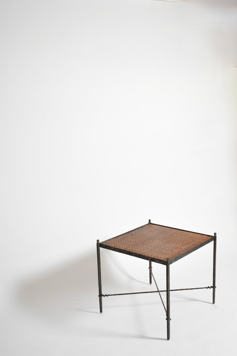 Pair of Wrought Iron and Wicker Side Tables, 1970s — lifestyle setting