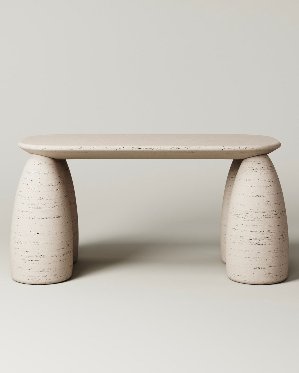 Minimalist travertine desk with cylindrical legs by Monolith
