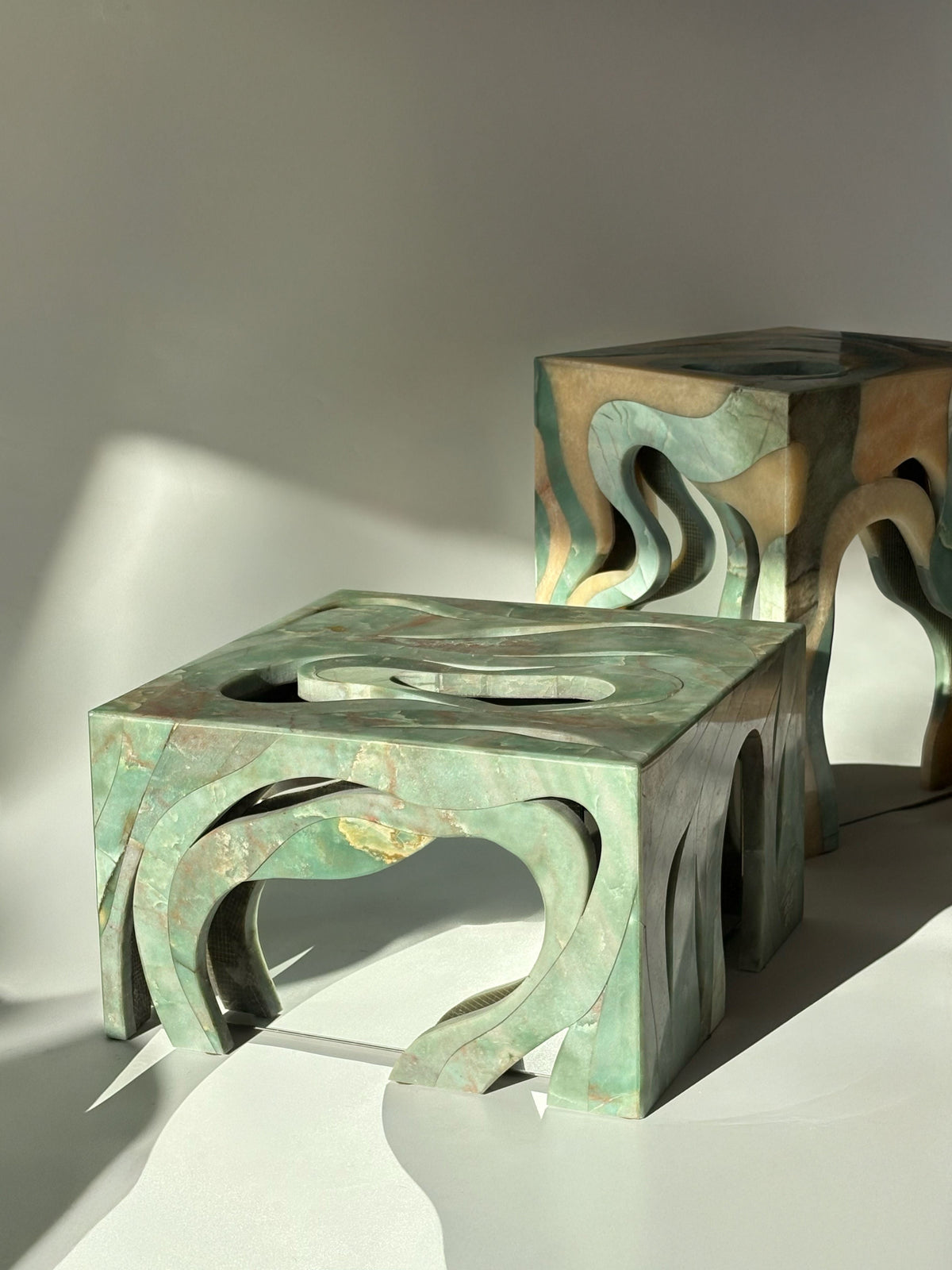 Orbis' Marble Side Table — top view showing green marble design