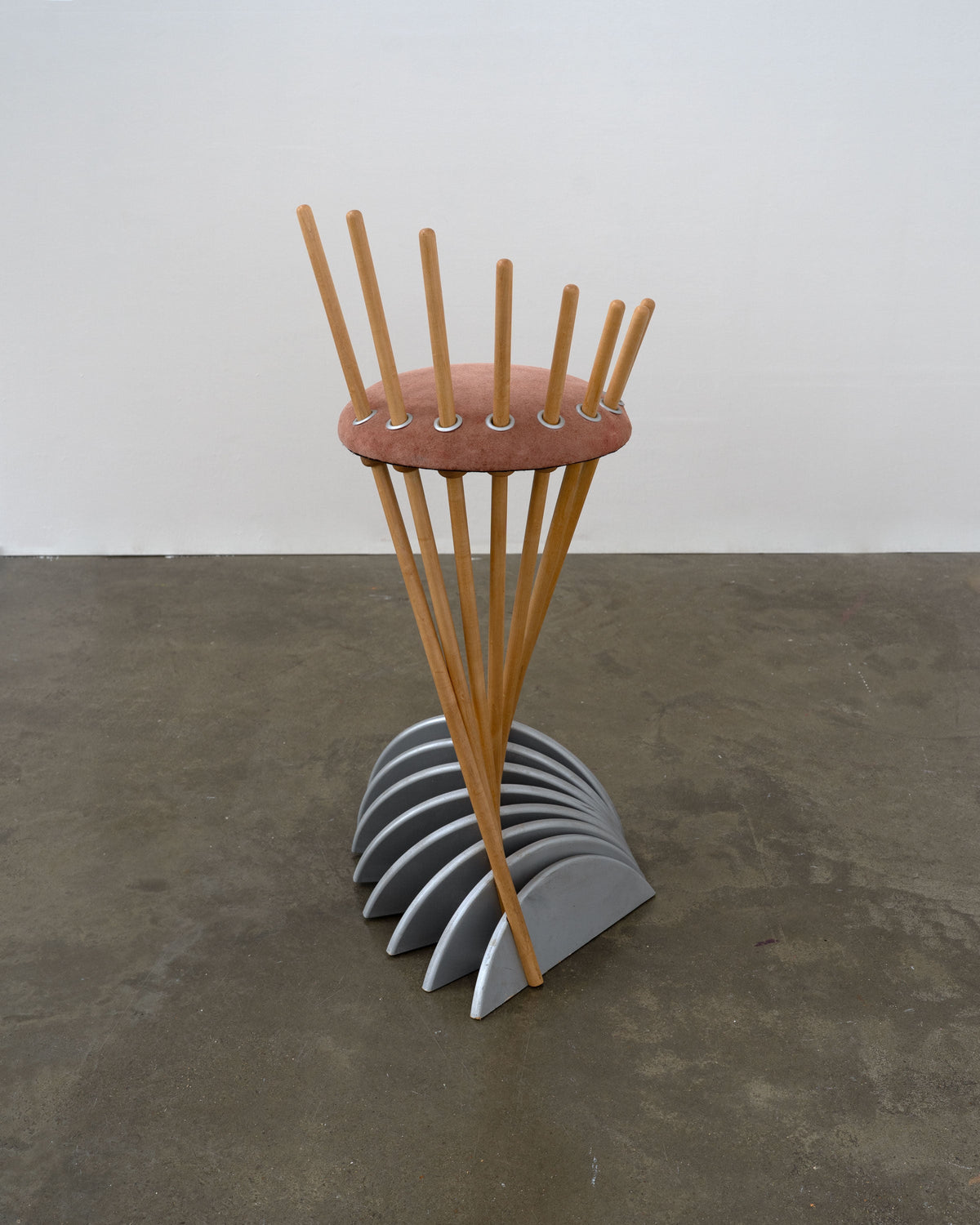 Postmodern prototype stool with wooden spindles and curved base by Isabelle Moore