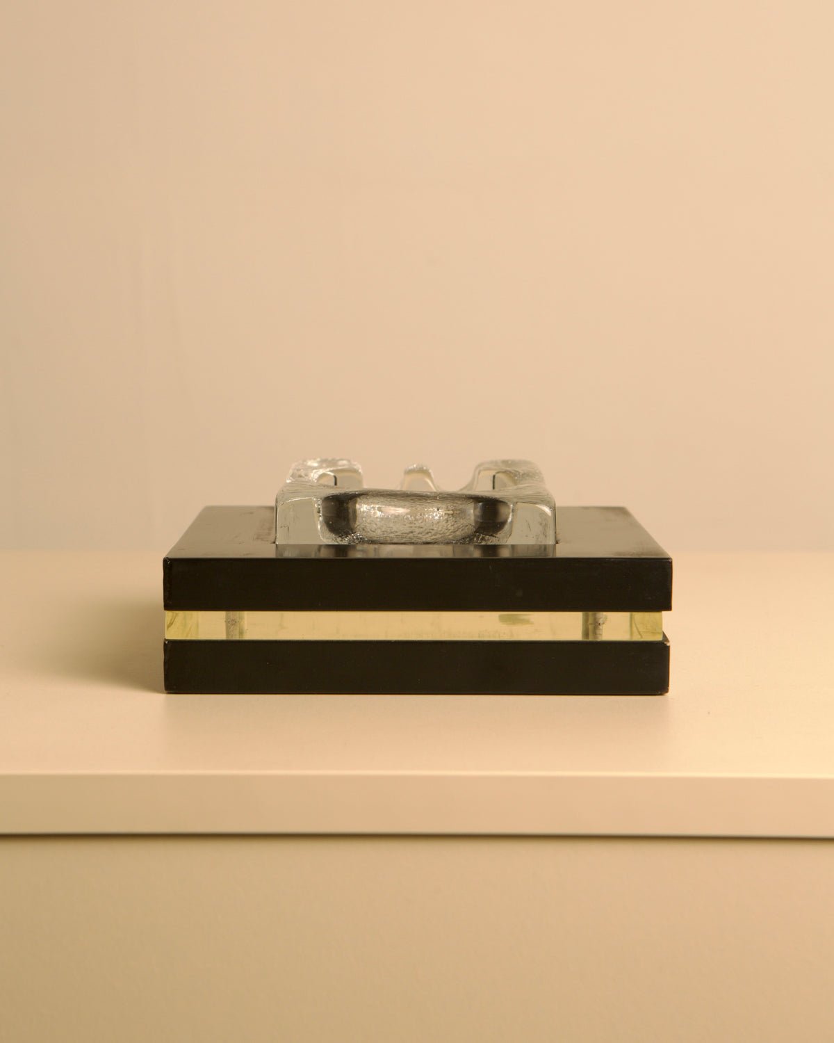 Italy, 1960s. Rolled brass, worked flat with an almost architectural rigour, marks a momen — alternate view
