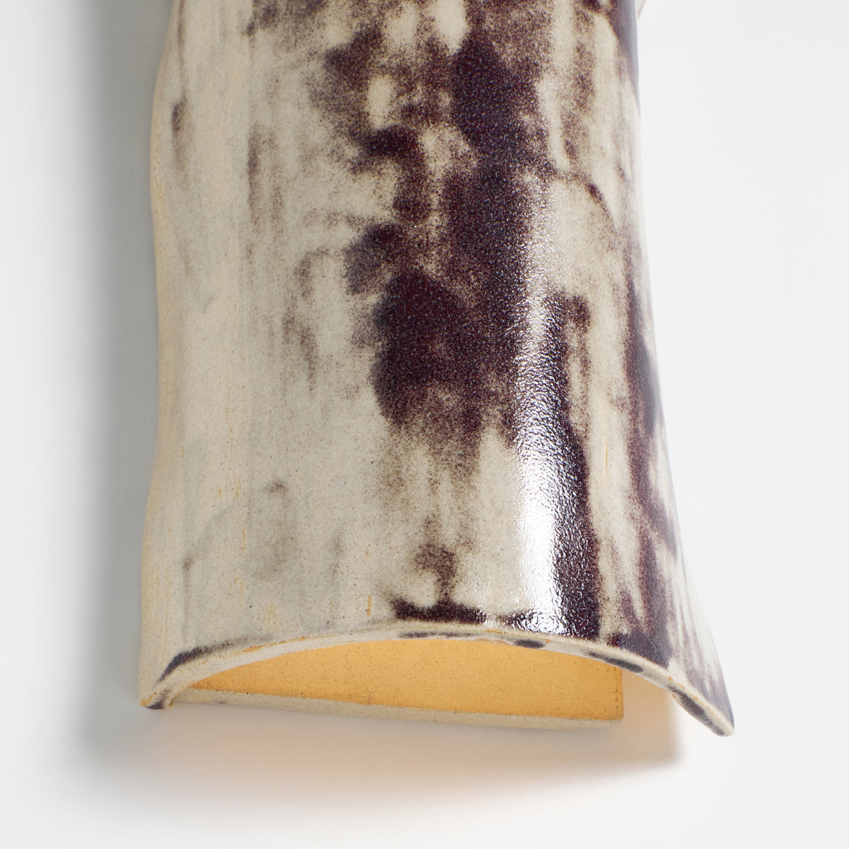 Papel Wall Light (large) — back view highlighting textured ceramic finish