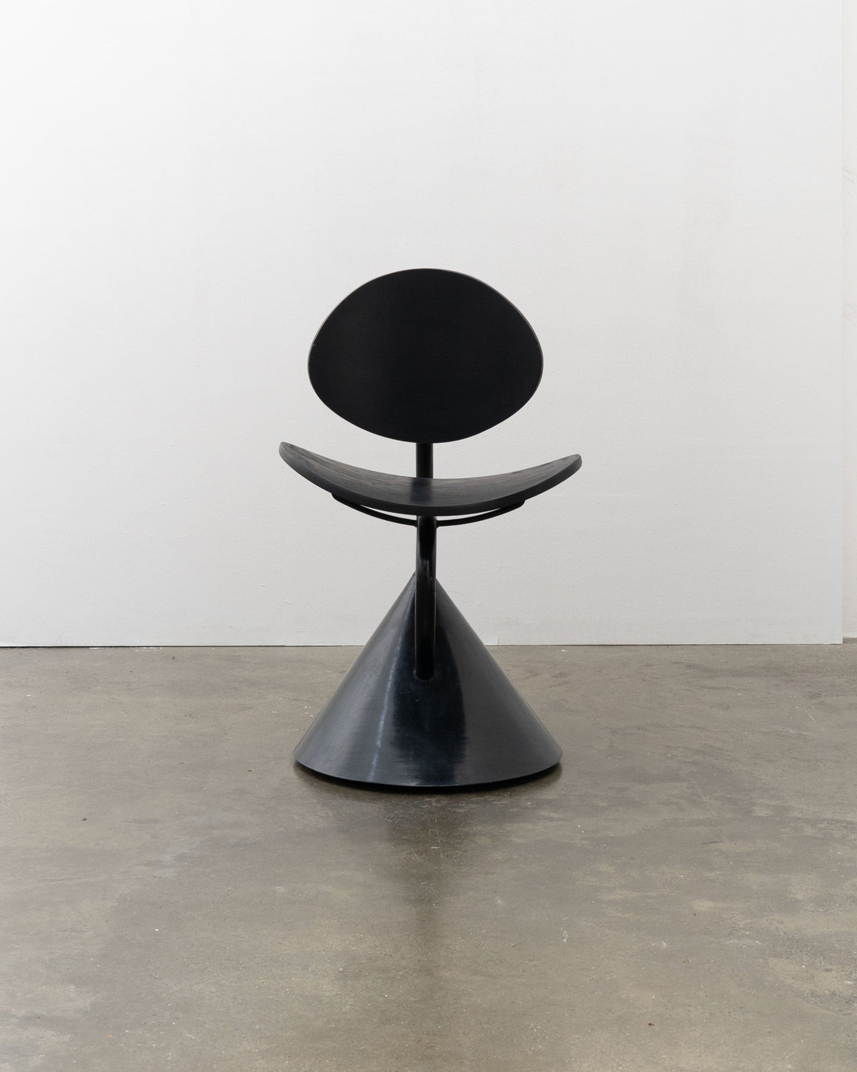 Hotel Zeus Chair by Ron Arad for Zeus, 1992 — front view on concrete floor