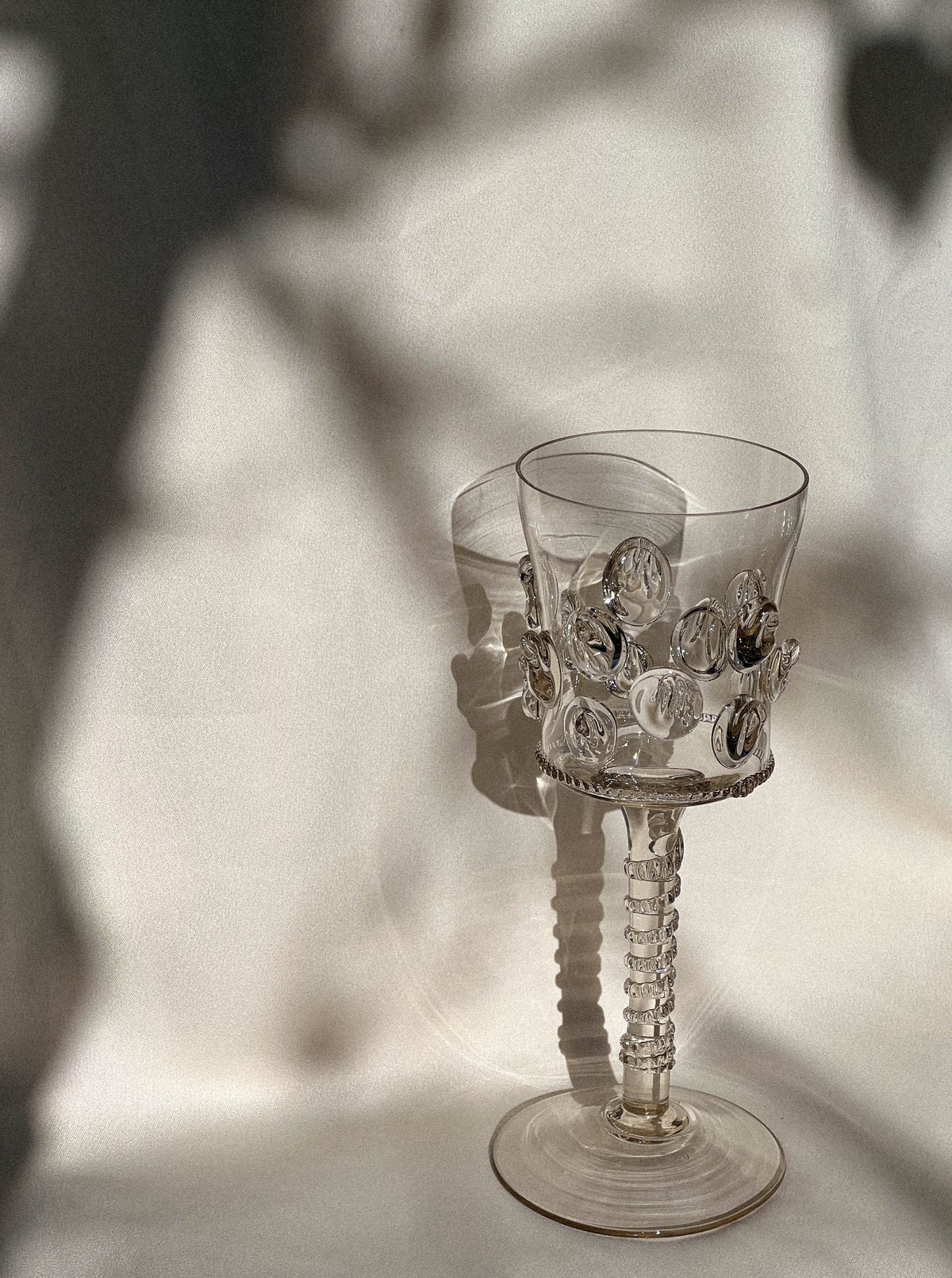 Pair of Mouthblown Wine Glass - Dots — side view with clear glass and decorative dots
