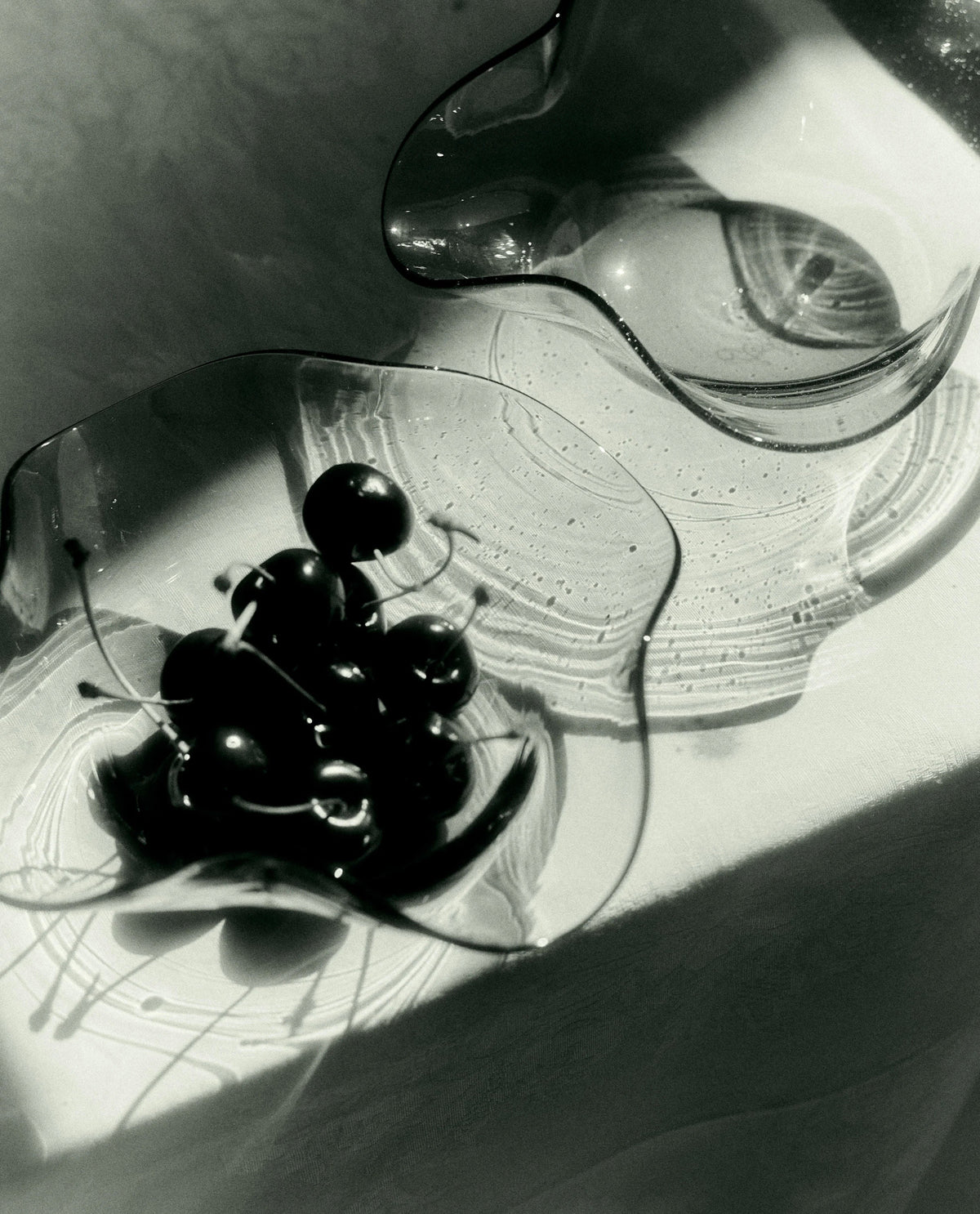 Michele Bowl Small — top view with black cherries in glass dish