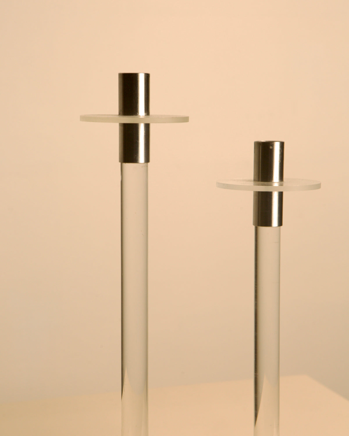 Two Italian lucite candlesticks with silver tops, 1970s vintage