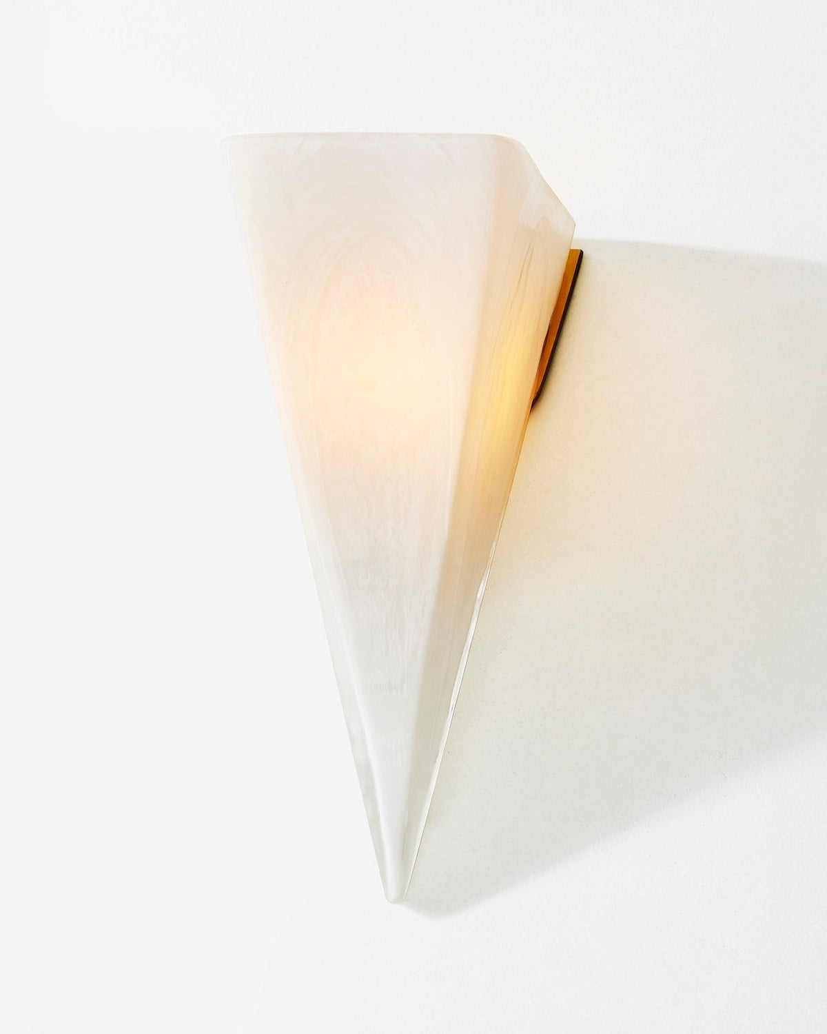 Translucent blown glass pendant light with trapezoidal silhouette