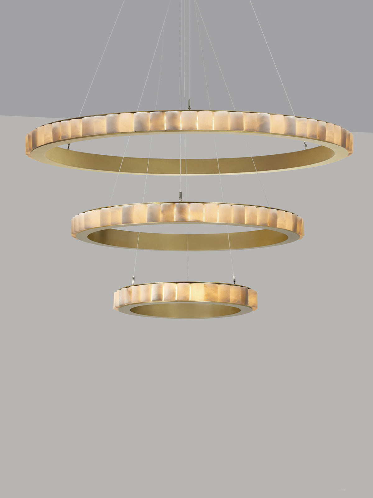 AVALON Triple Chandelier With Ceiling Rose — side view highlighting layered brass rings