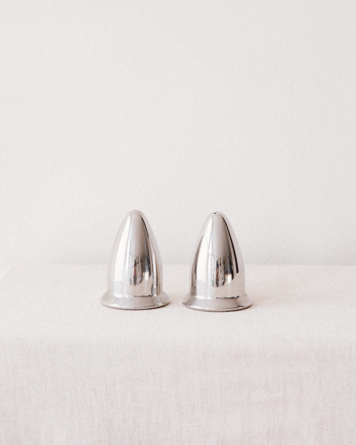 Chrome Salt & Pepper Shakers by Arcā Collections | The Oblist — polished metal finish