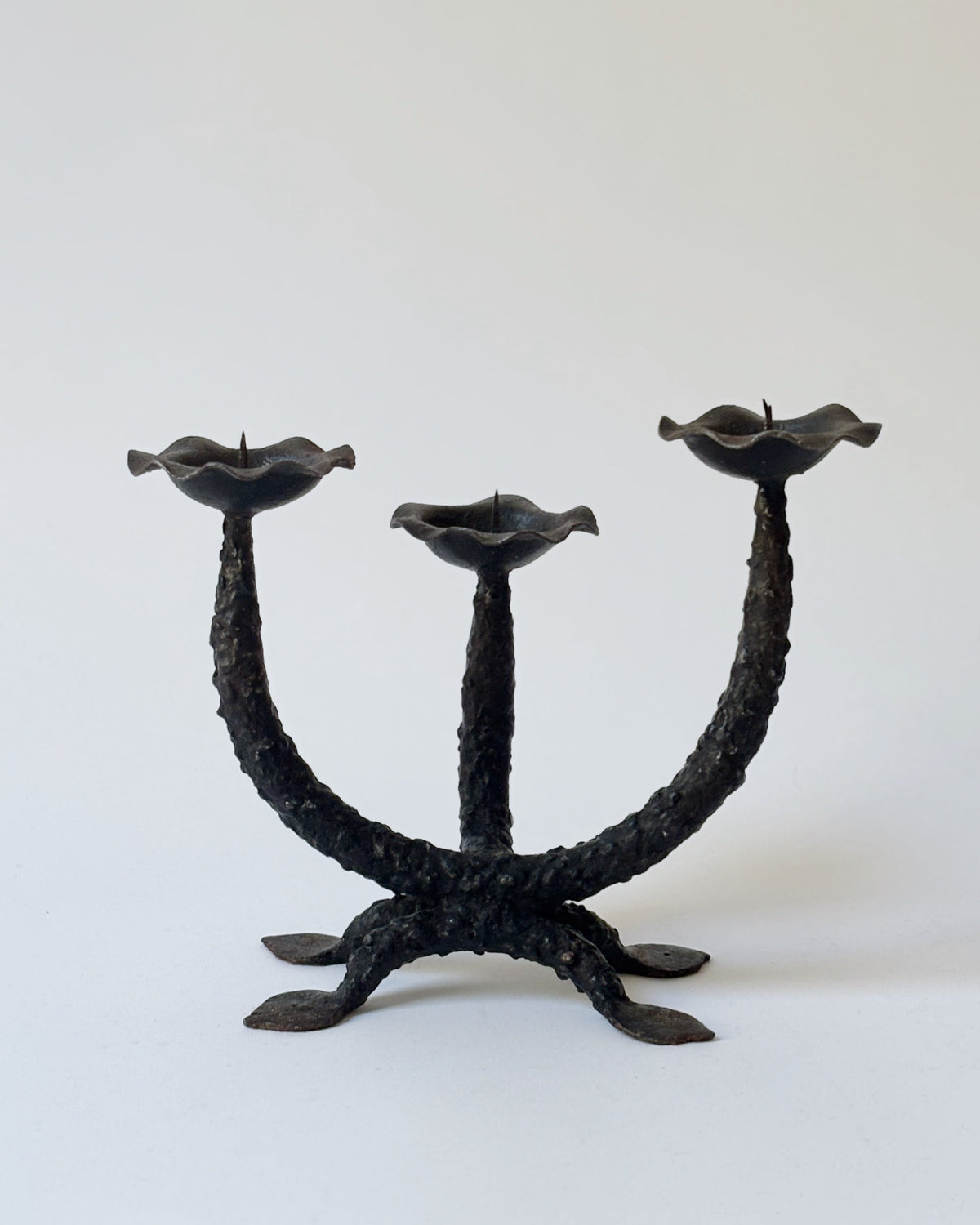 Metal Textured Artisan Candlestick, Poland — close-up of black metal texture