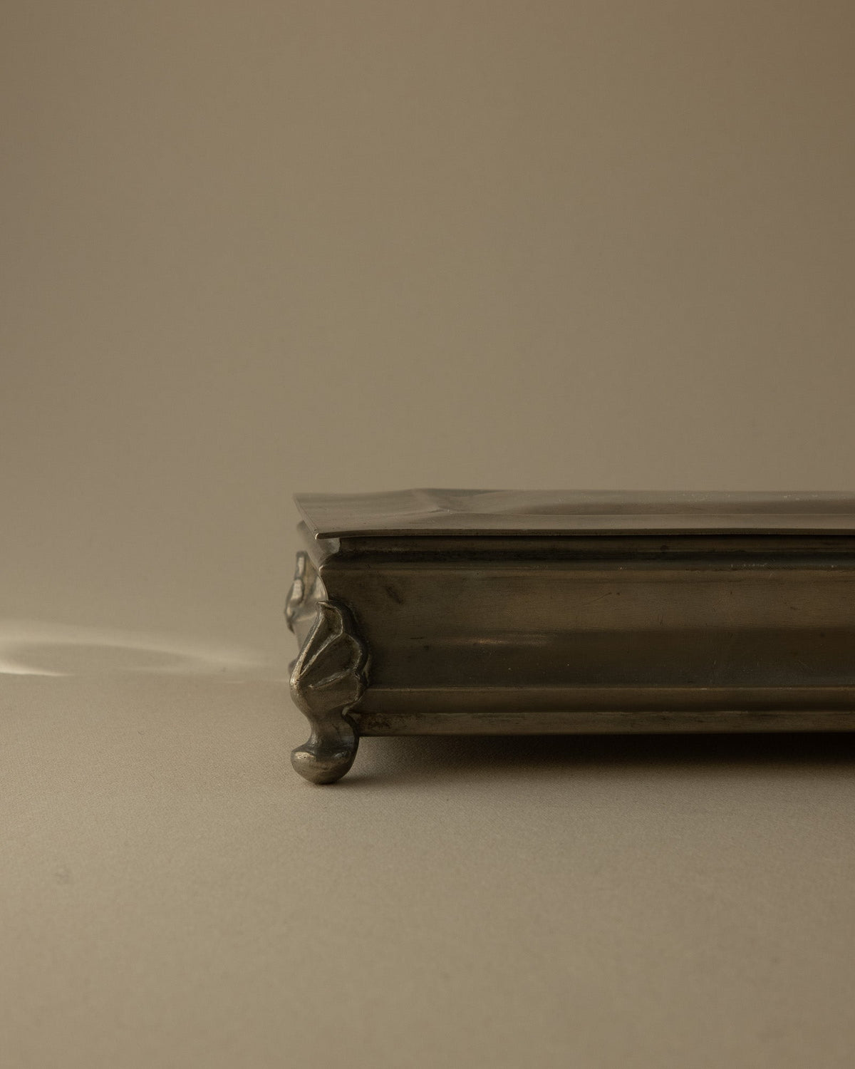 Mabos Swedish Grace Pewter Box on Sculpted Corner Feet (c. 1930s) — detail view