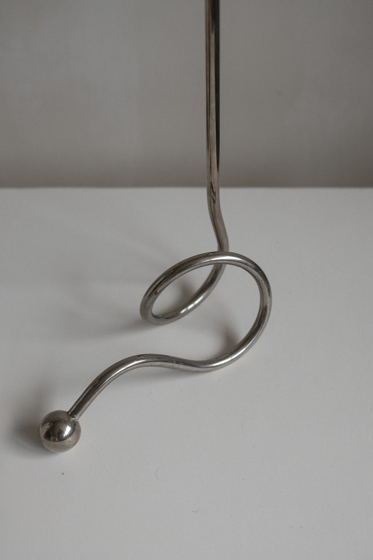Chrome Candle Holder by Guido Niest — close-up