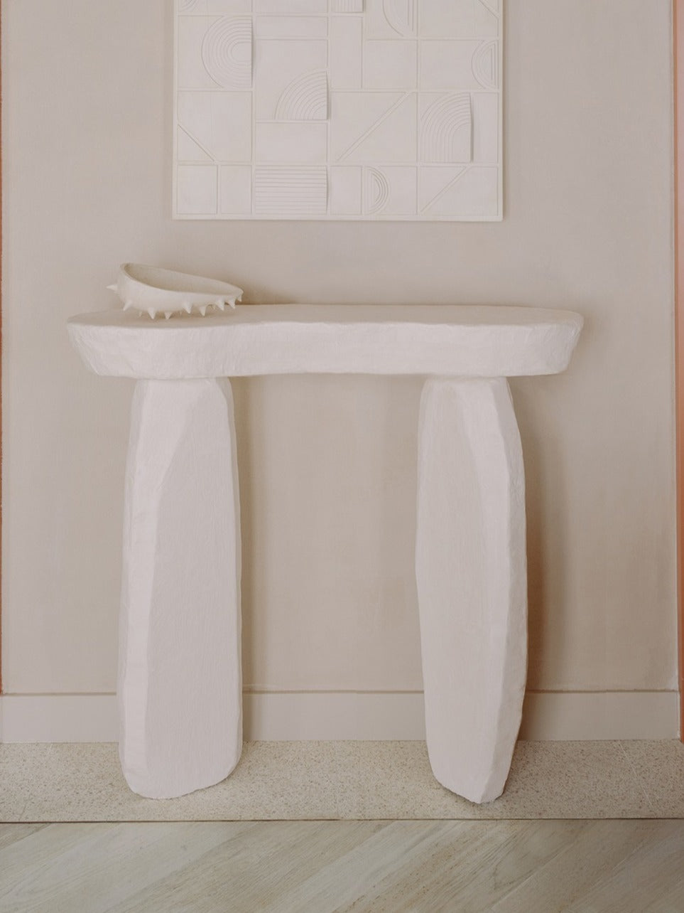 Ruins Console 1.0 — close-up of textured white surface against wall