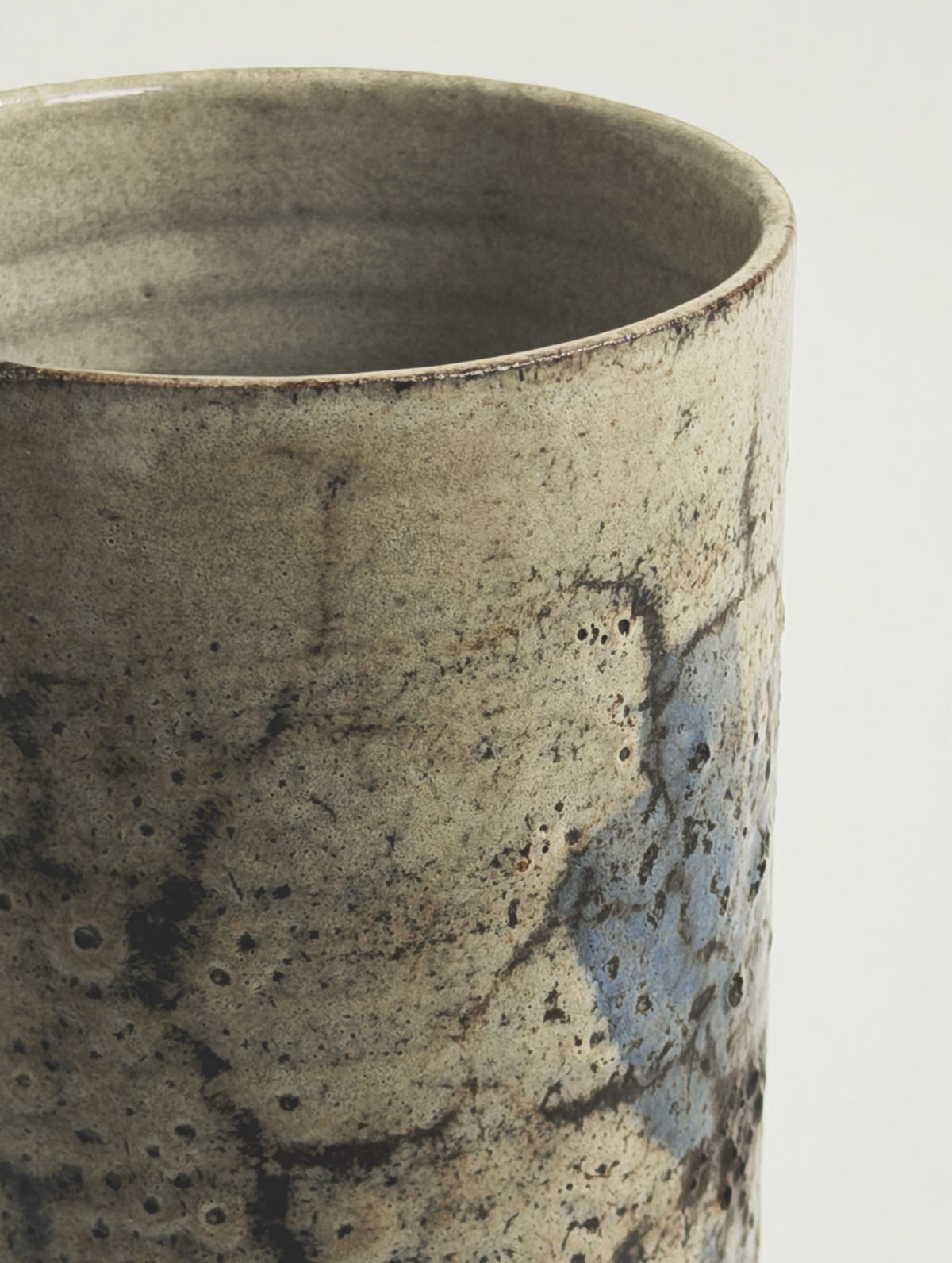 Roller vase by Gustave Reynaud, Atelier Le Mûrier, Vallauris, circa 1960 — close-up of textured ceramic surface with earthy t