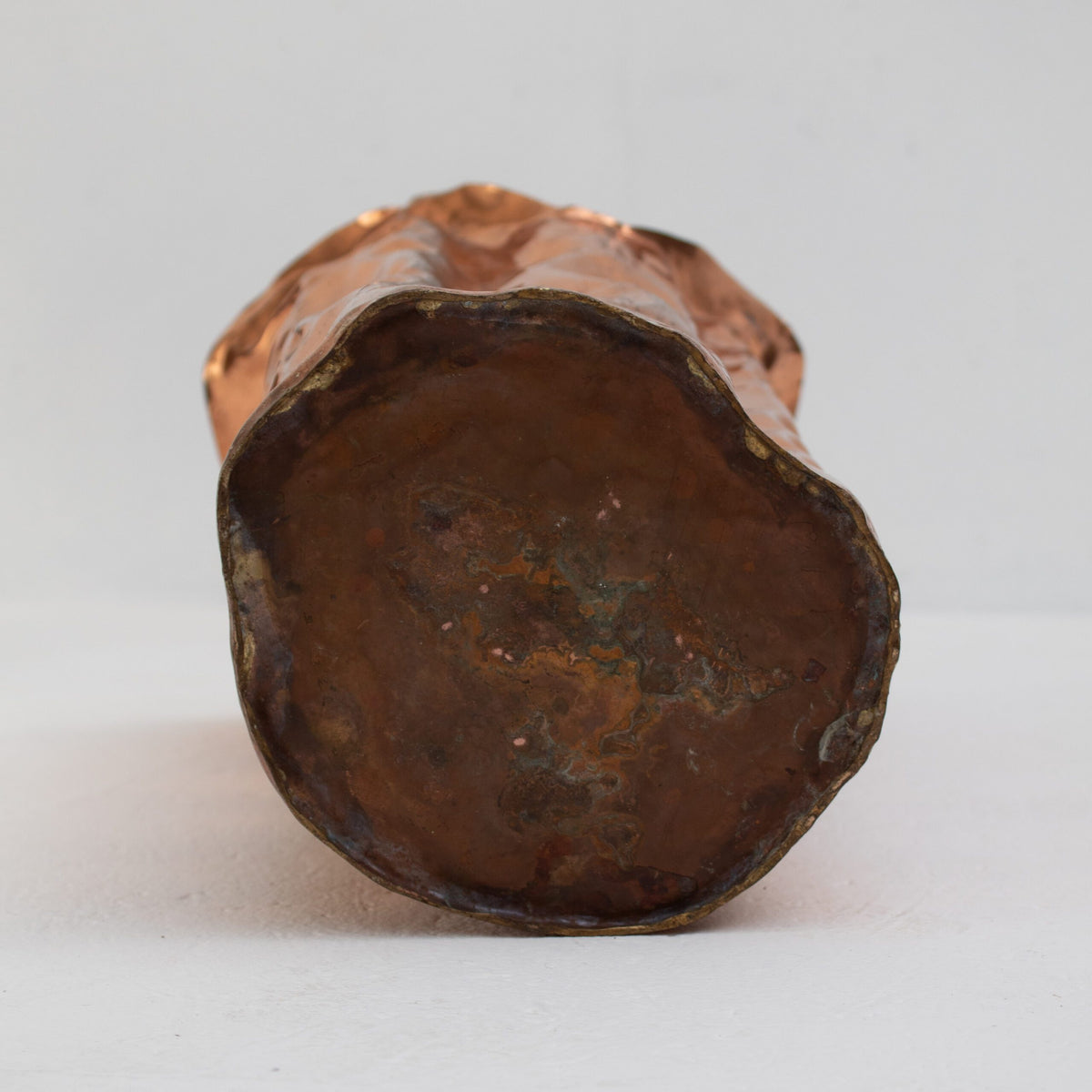 Bragalini Hammered Copper Vase — bottom view highlighting textured copper surface