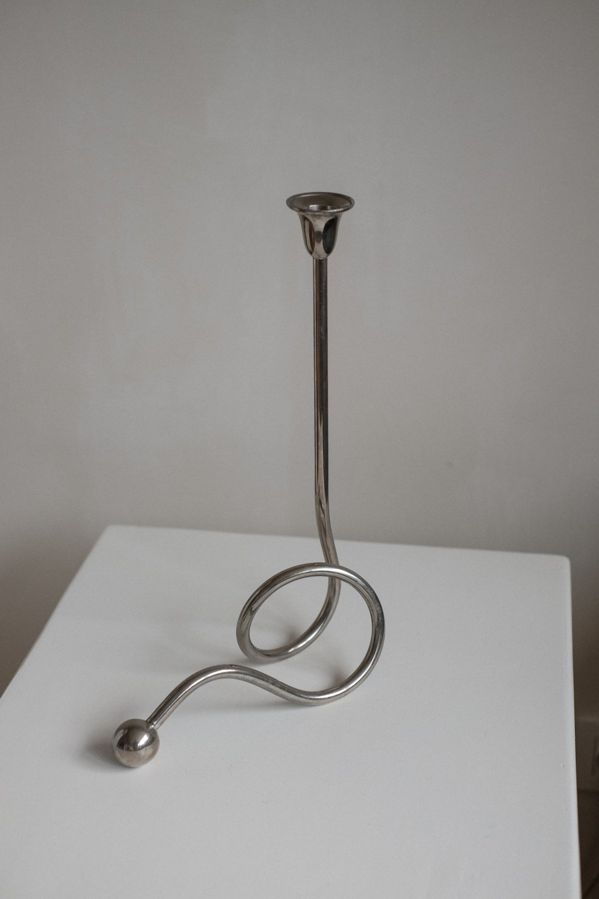 Chrome Candle Holder by Guido Niest — lifestyle setting