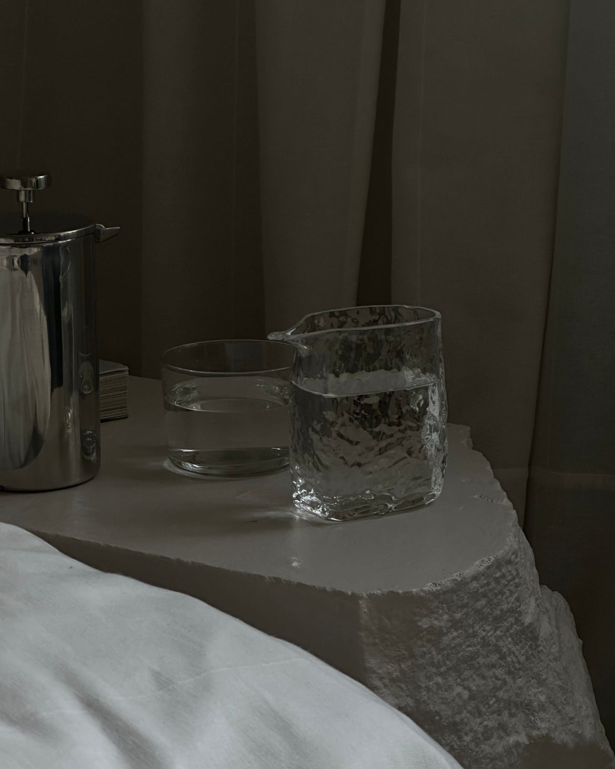 'DELIRIUM' small glass pitcher — close-up