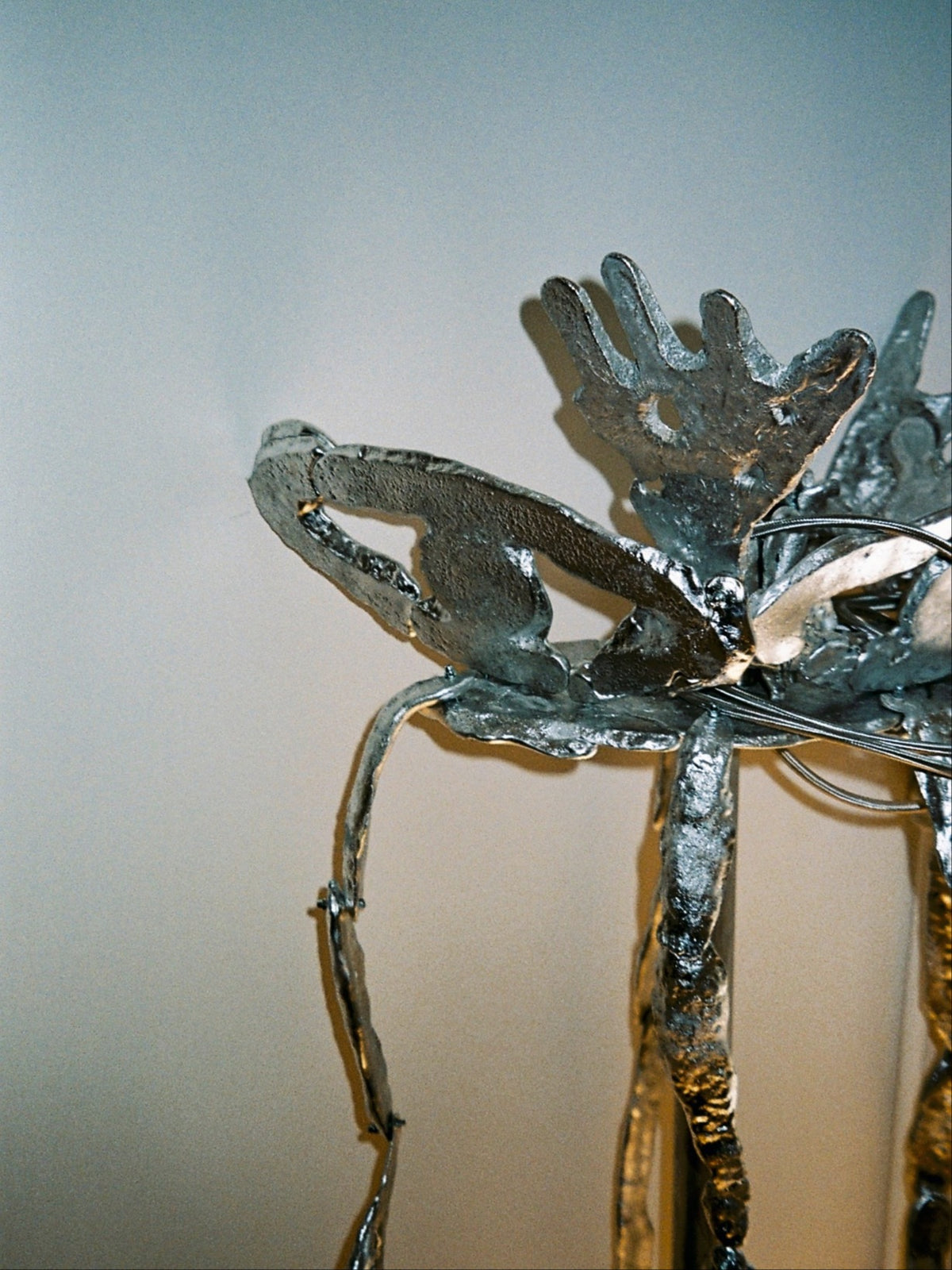 Detail of sculptural bronze dragon-shaped floor lamp by Ia Kutateladze