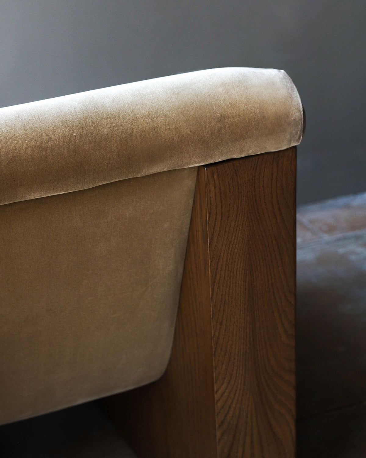 Curved upholstered backrest detail of Doheny lounge chair