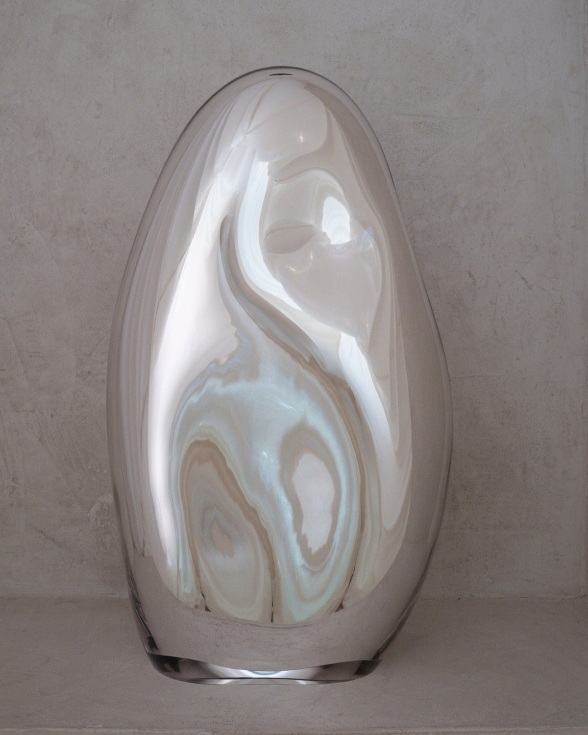 Standing Glass Sculpture - Contemporary Mirror Collection — close-up of reflective glass surface