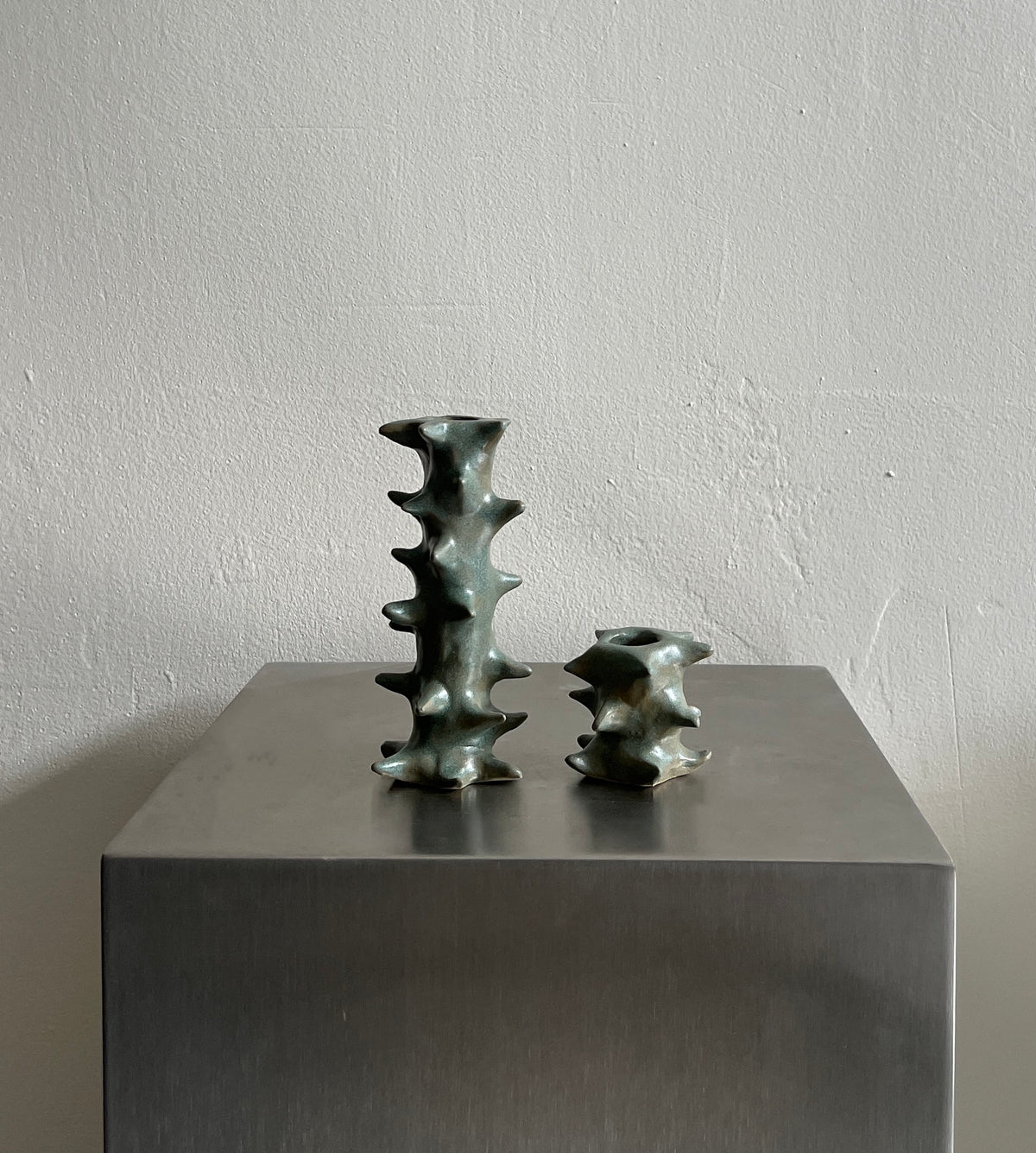 Pair of Candle Holders in green ceramic — detail view