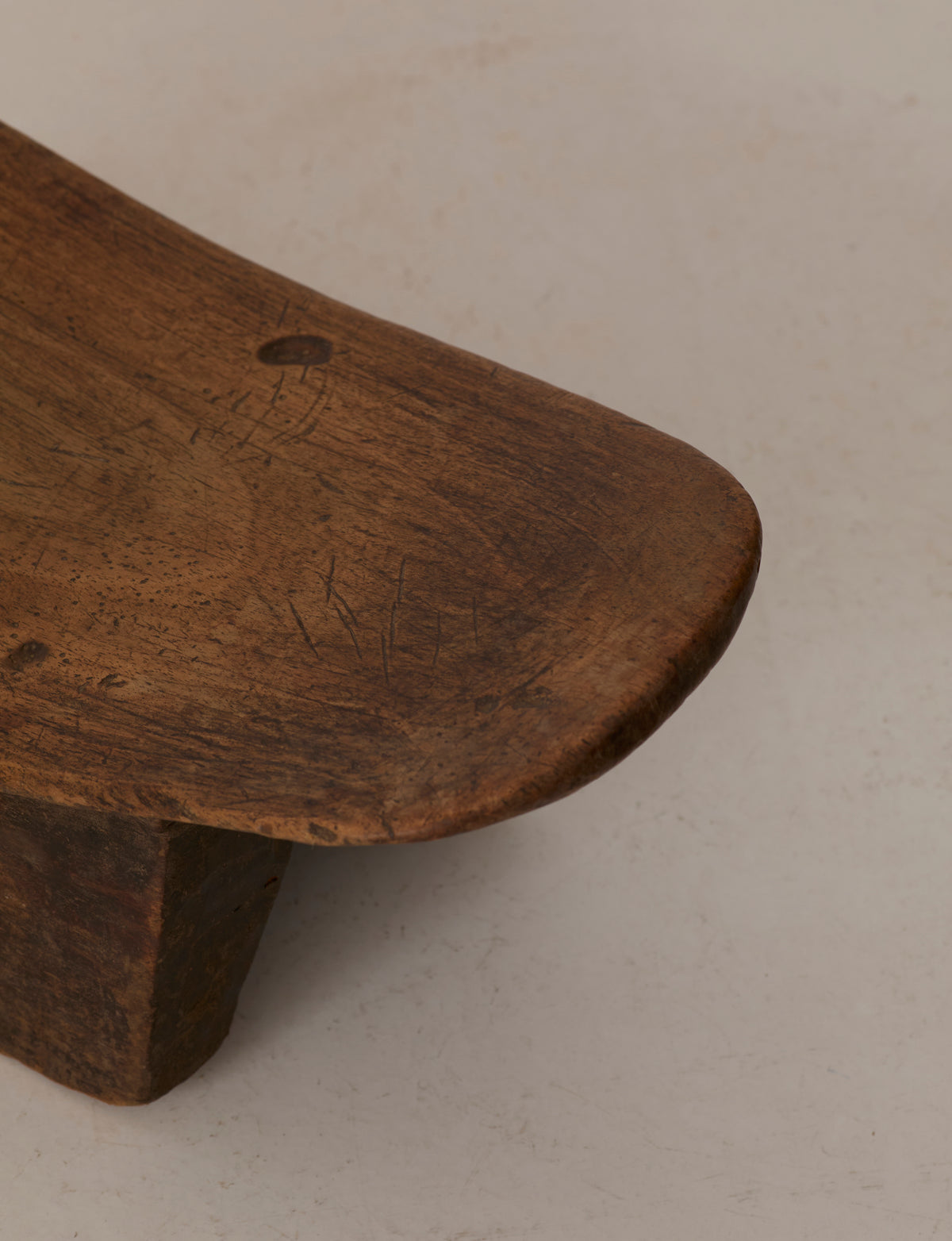 Mid-Century African Senufo Stool in Solid Wood — close-up of carved wooden seat
