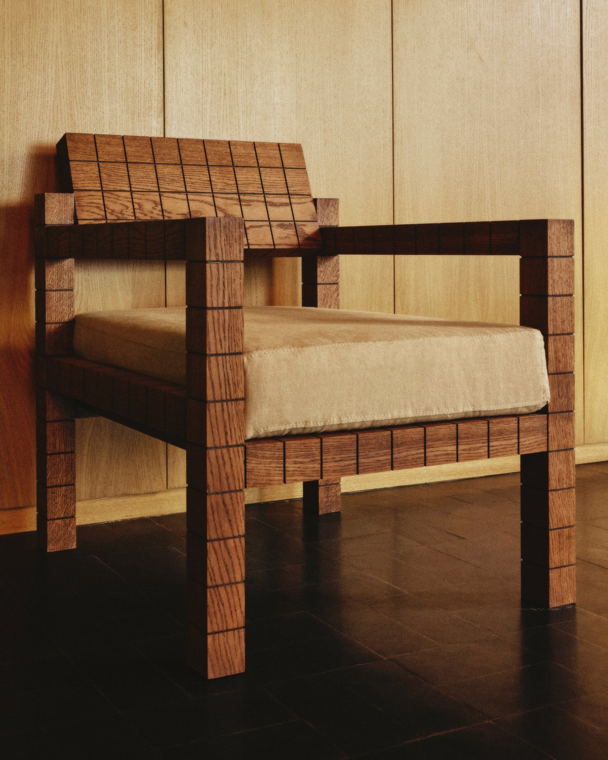 Mosaico Armchair — angled view highlighting wooden frame and cushion