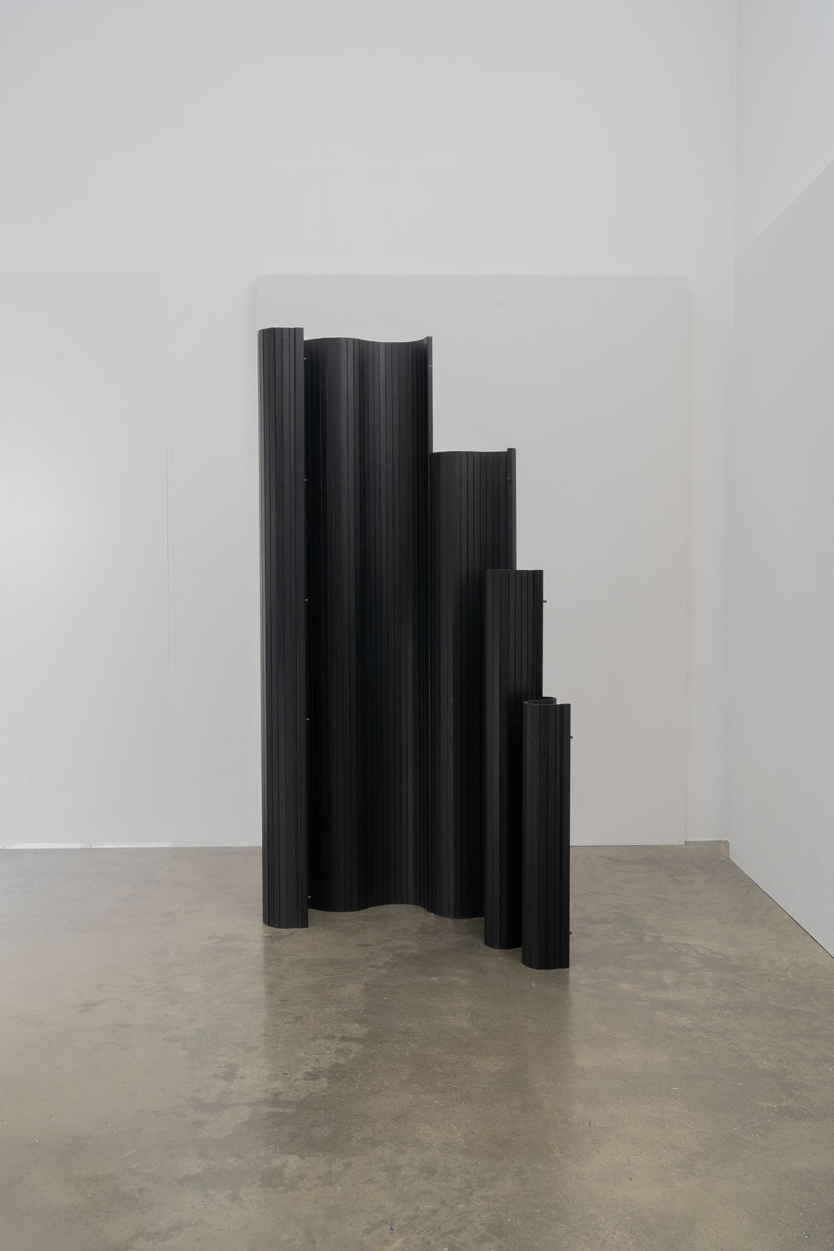Sculptural Tambour Screen in Fumed Poplar by Tom Roberts — angled view in minimalist gallery setting